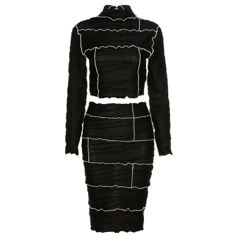 Black women dress set featuring a turtleneck design, full sleeves, and above-knee length, made from high-quality polyester.