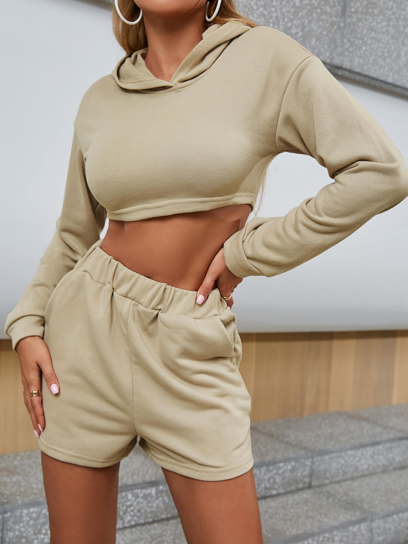 Lace-Up Cropped Hoodie and Shorts Set featuring a stylish lace-up design, hooded neckline, and comfortable fit, made from 100% polyester.