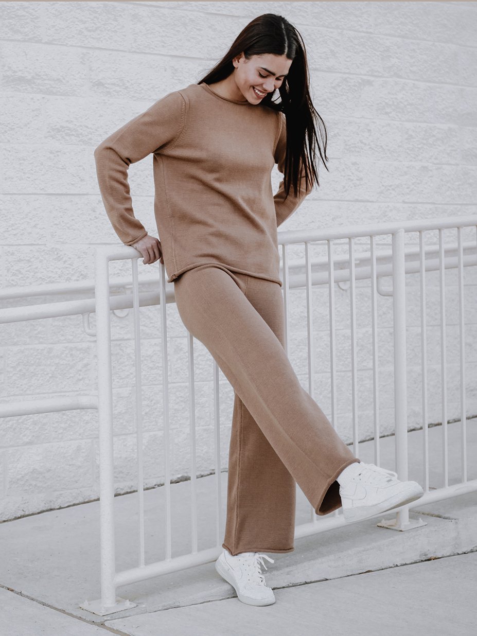 Tarlo Cashmere Pants featuring a high-rise ribbed waistband and wide leg silhouette, made from a soft cashmere wool blend.