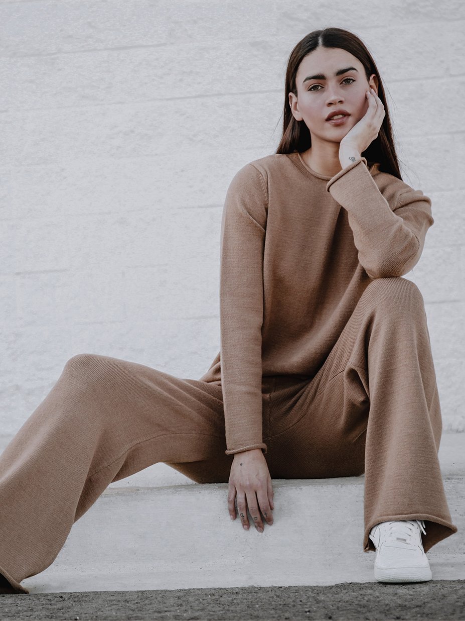 Tarlo Cashmere Pants featuring a high-rise ribbed waistband and wide leg silhouette, made from a soft cashmere wool blend.