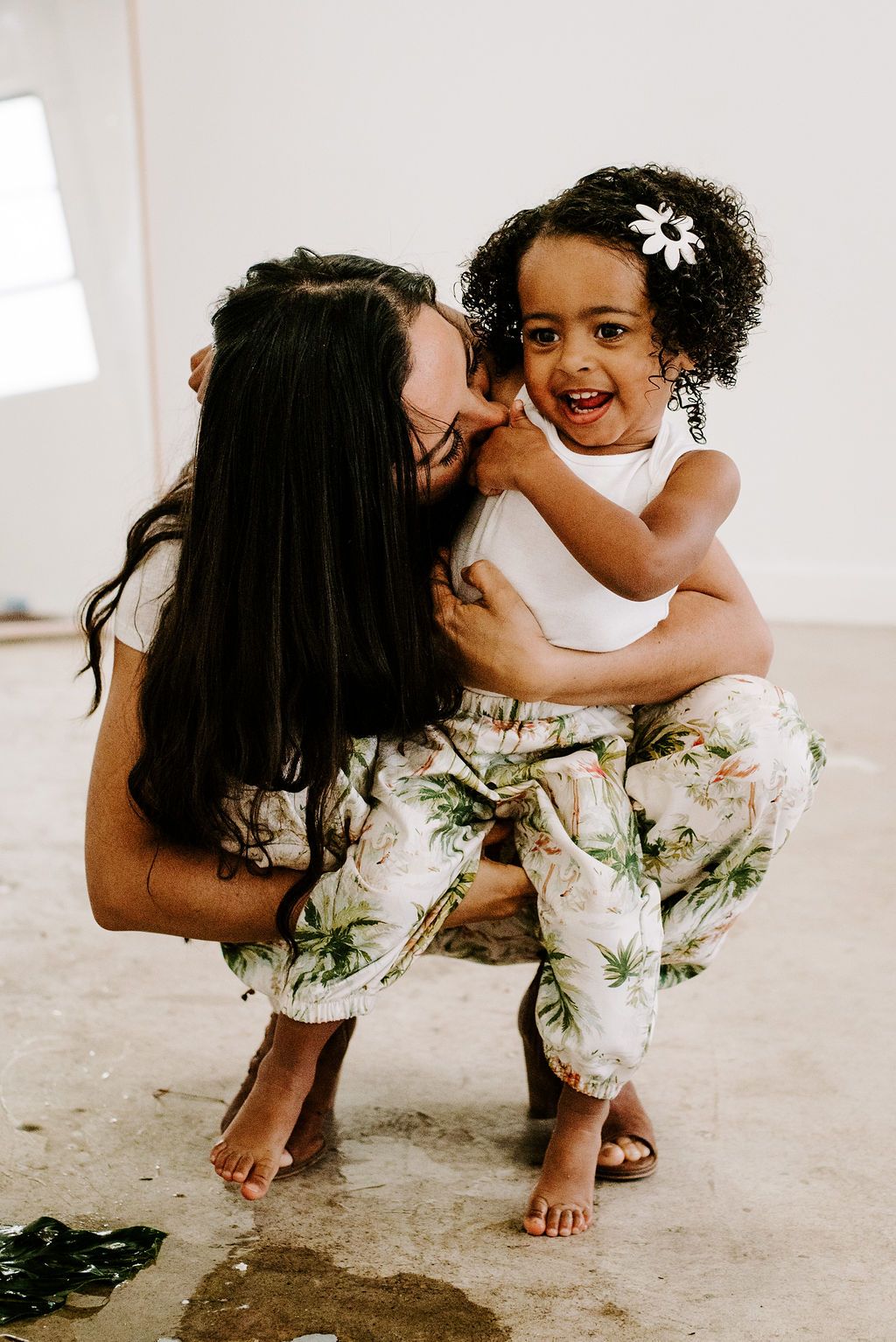 A pair of Ashley Rose Adult Joggers in vibrant flamingo color, featuring an elastic waistband and pockets for convenience.