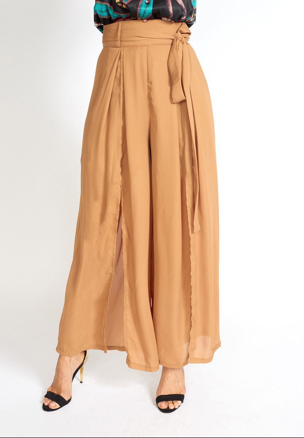 Alessandra Wide Leg Slit Pants featuring a polka-dot print, high-rise waist, and stylish knee slit.