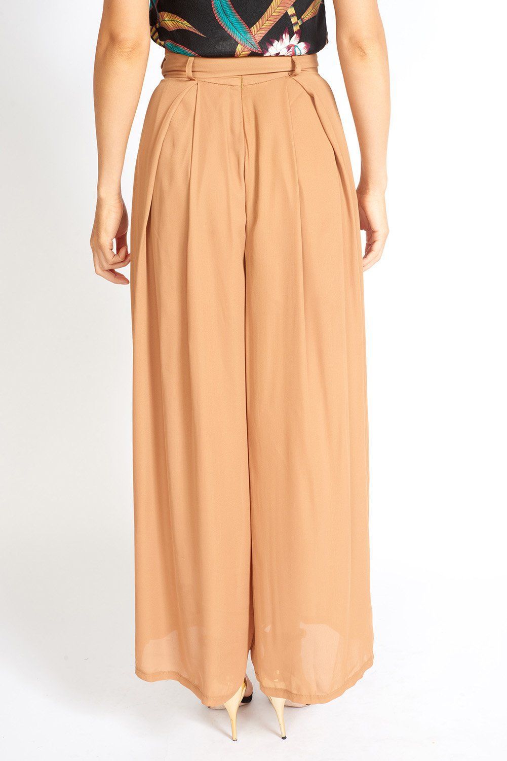 Alessandra Wide Leg Slit Pants featuring a polka-dot print, high-rise waist, and stylish knee slit.