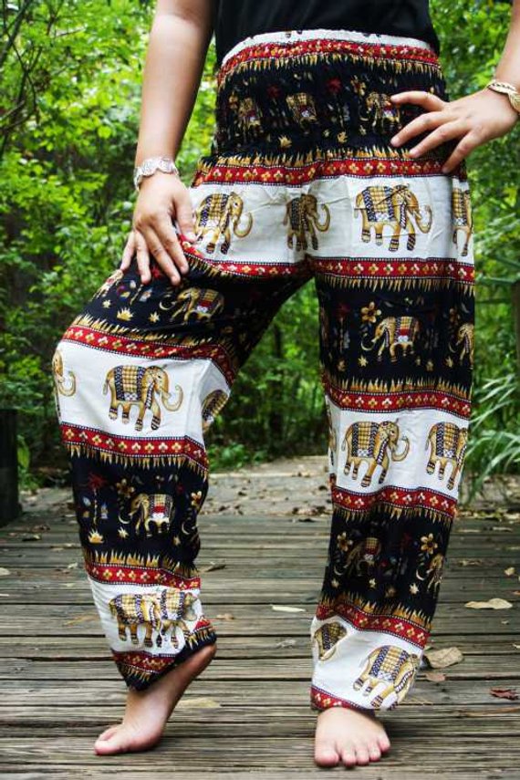 Black Elephant Harem Pants for women, featuring a bohemian design, elastic waist, and ankle cuffs, made from lightweight breathable rayon fabric.