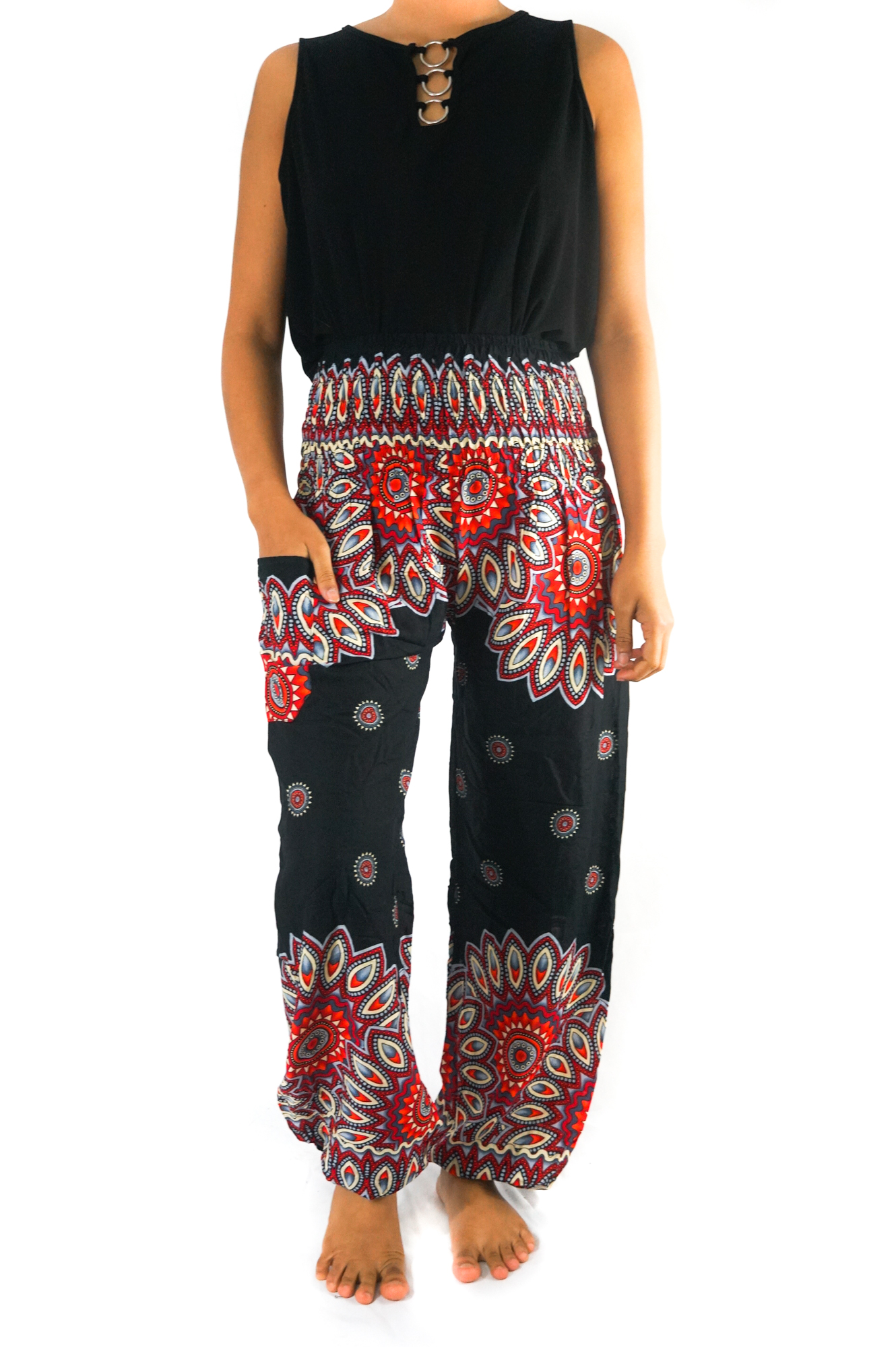 Black floral harem pants for women, featuring an elastic waist and ankle, made from lightweight rayon fabric, perfect for boho and hippie styles.