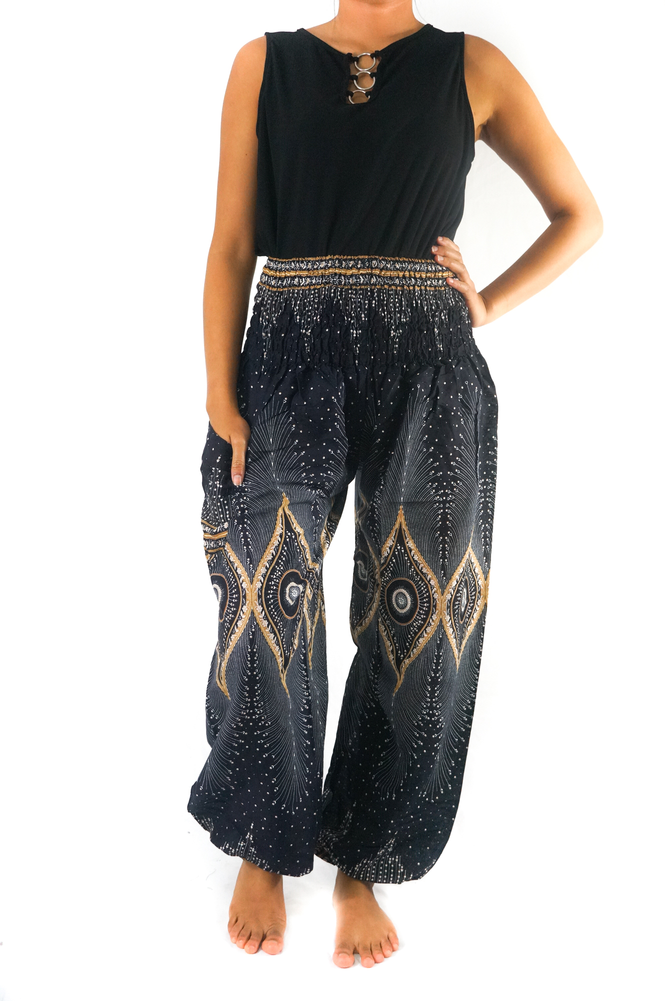 Black PEACOCK Women Boho Pants featuring a flowy design, elastic waist, and ankle, made from 100% breathable rayon fabric, perfect for yoga and casual wear.