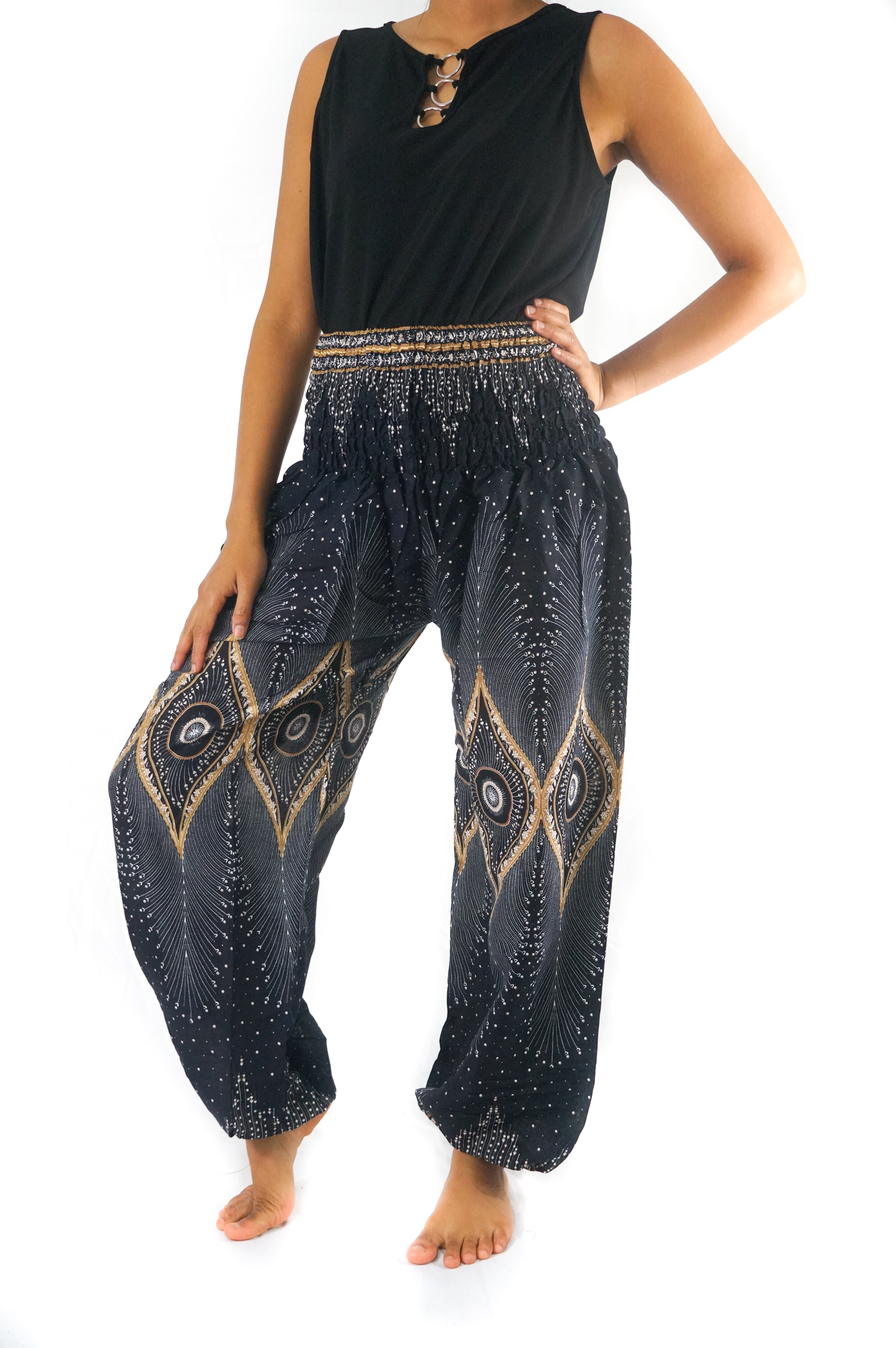 Black PEACOCK Women Boho Pants featuring a flowy design, elastic waist, and ankle, made from 100% breathable rayon fabric, perfect for yoga and casual wear.