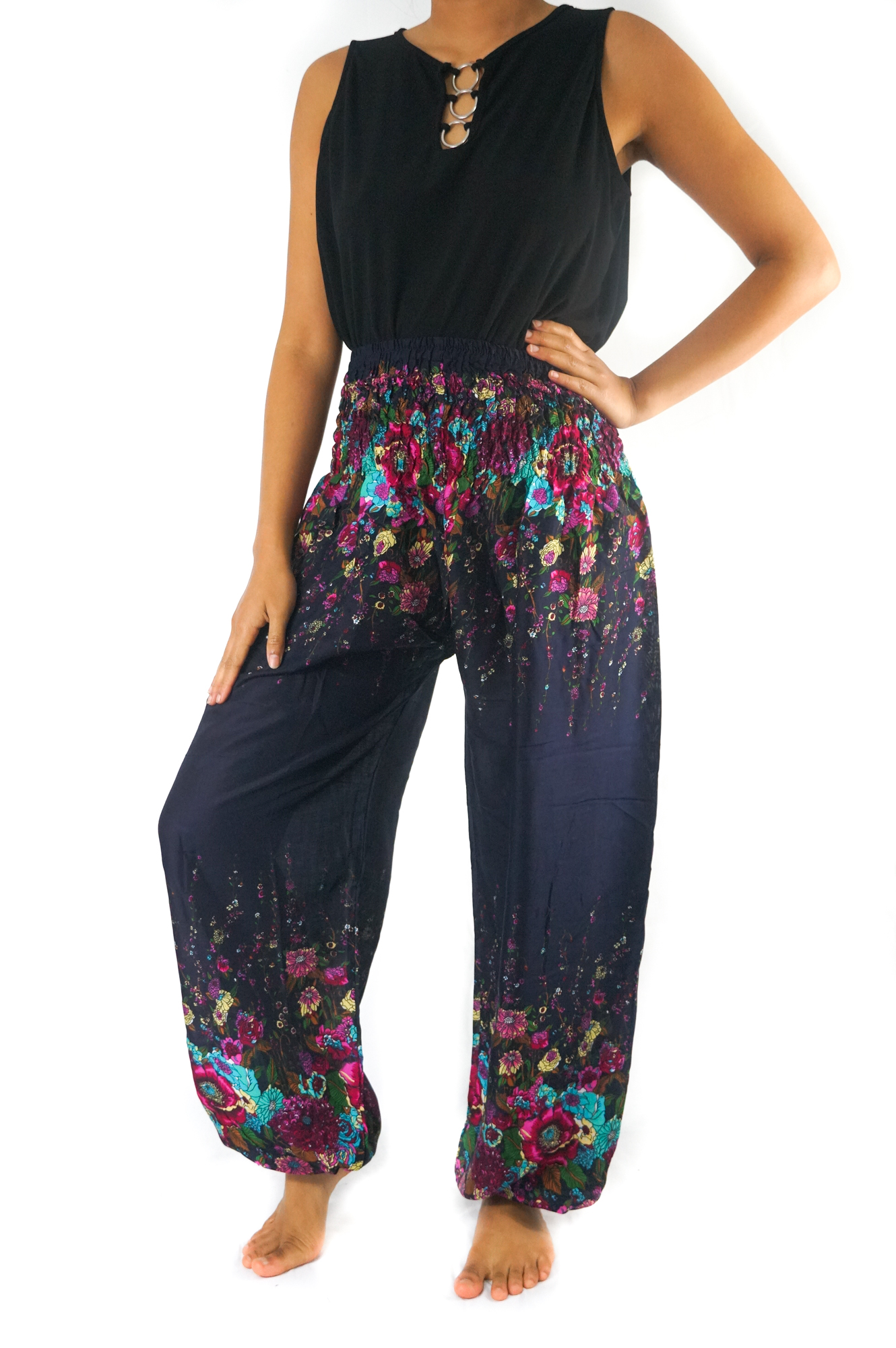 Blue floral women harem pants made of 100% rayon, featuring an elastic waist and ankle, one side pocket, and a loose, comfortable fit.