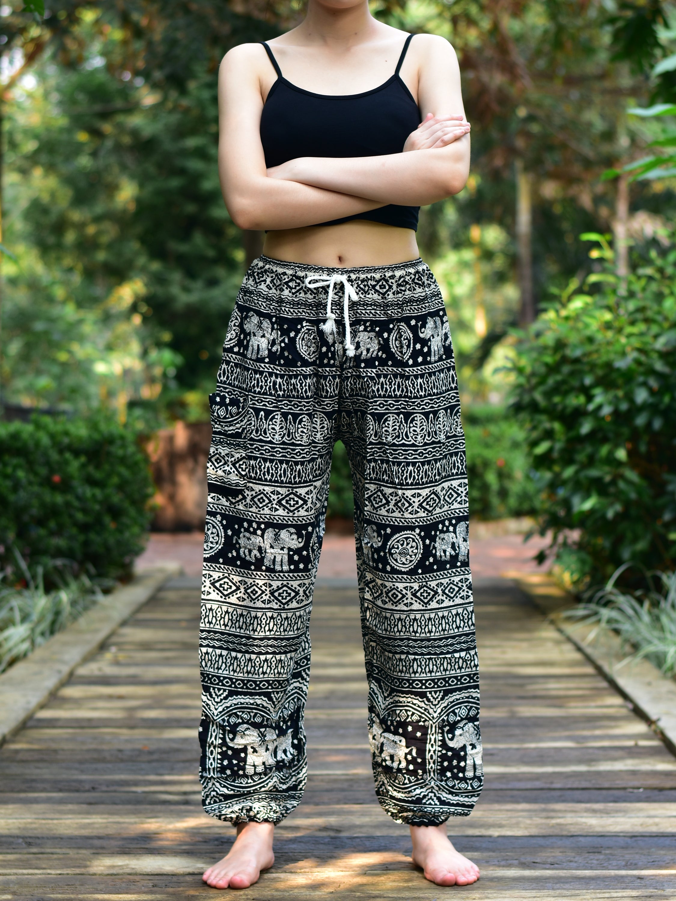 Bohotusk Black Elephant Calf Print Women's Harem Pants featuring a tie waist and elasticated ankles, perfect for casual and active wear.