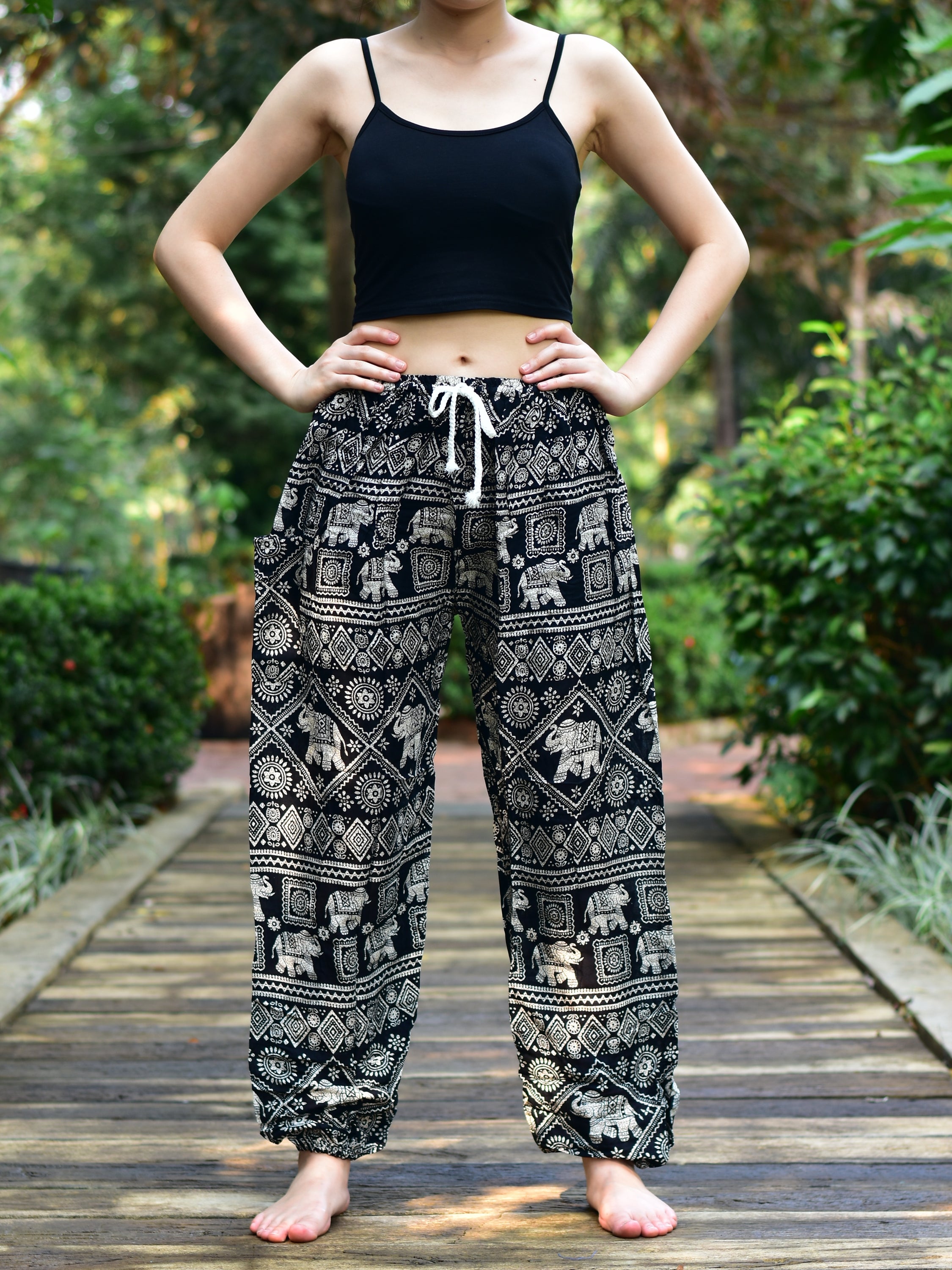 Bohotusk Black Elephant Print Women's Harem Pants featuring a drawstring waist and elasticated ankles, perfect for casual wear and yoga.