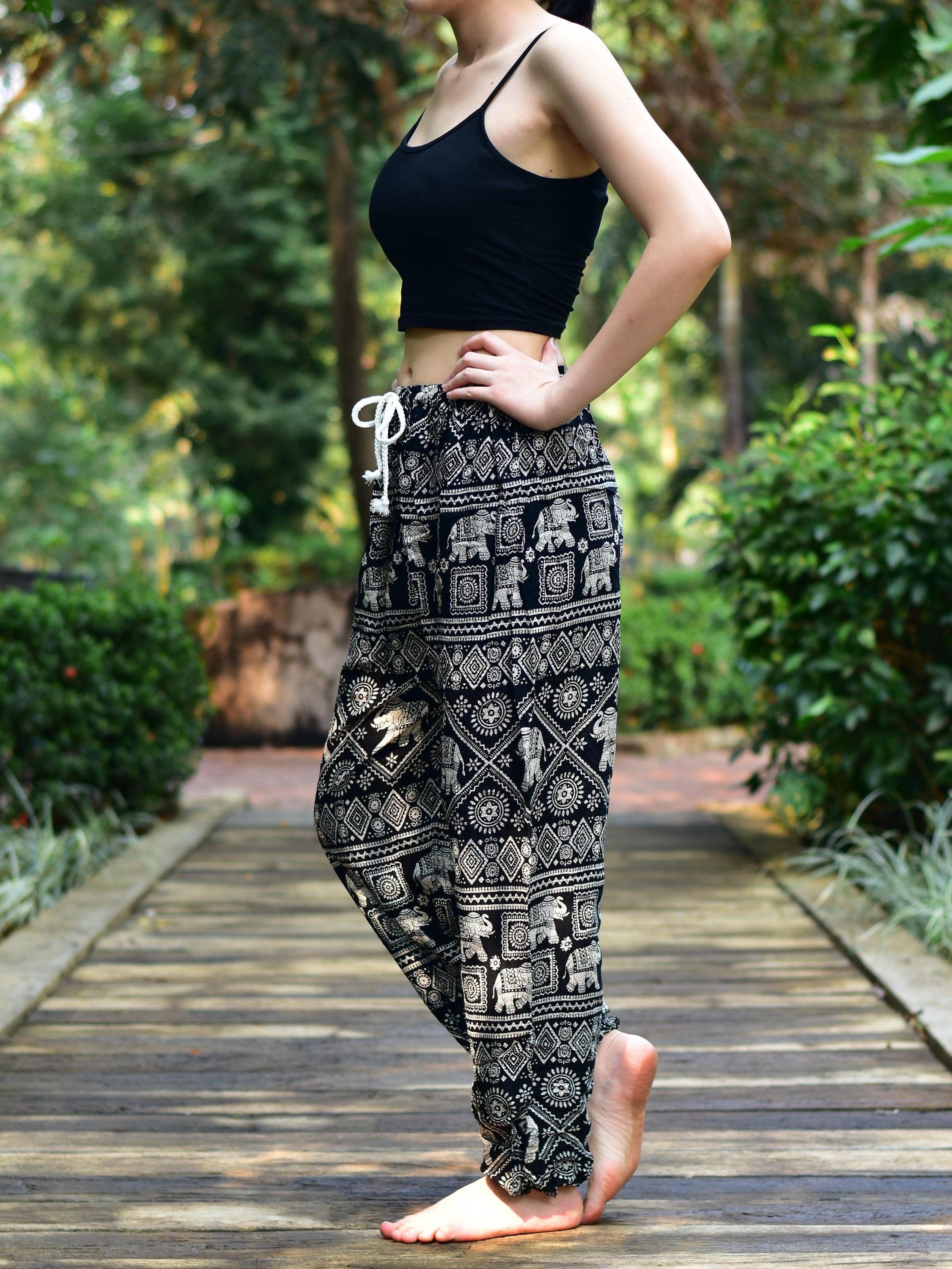 Bohotusk Black Elephant Print Women's Harem Pants featuring a drawstring waist and elasticated ankles, perfect for casual wear and yoga.