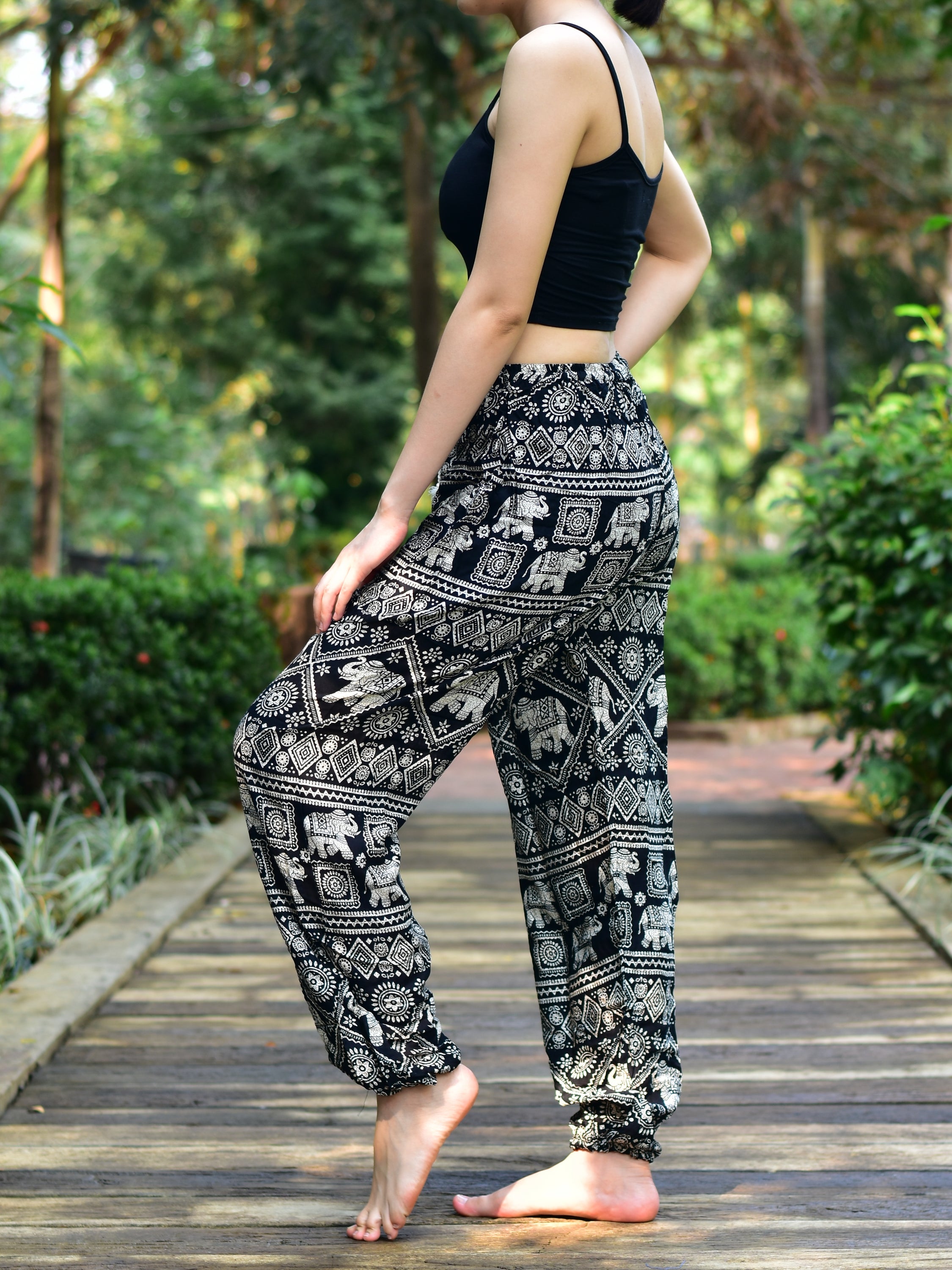 Bohotusk Black Elephant Print Women's Harem Pants featuring a drawstring waist and elasticated ankles, perfect for casual wear and yoga.