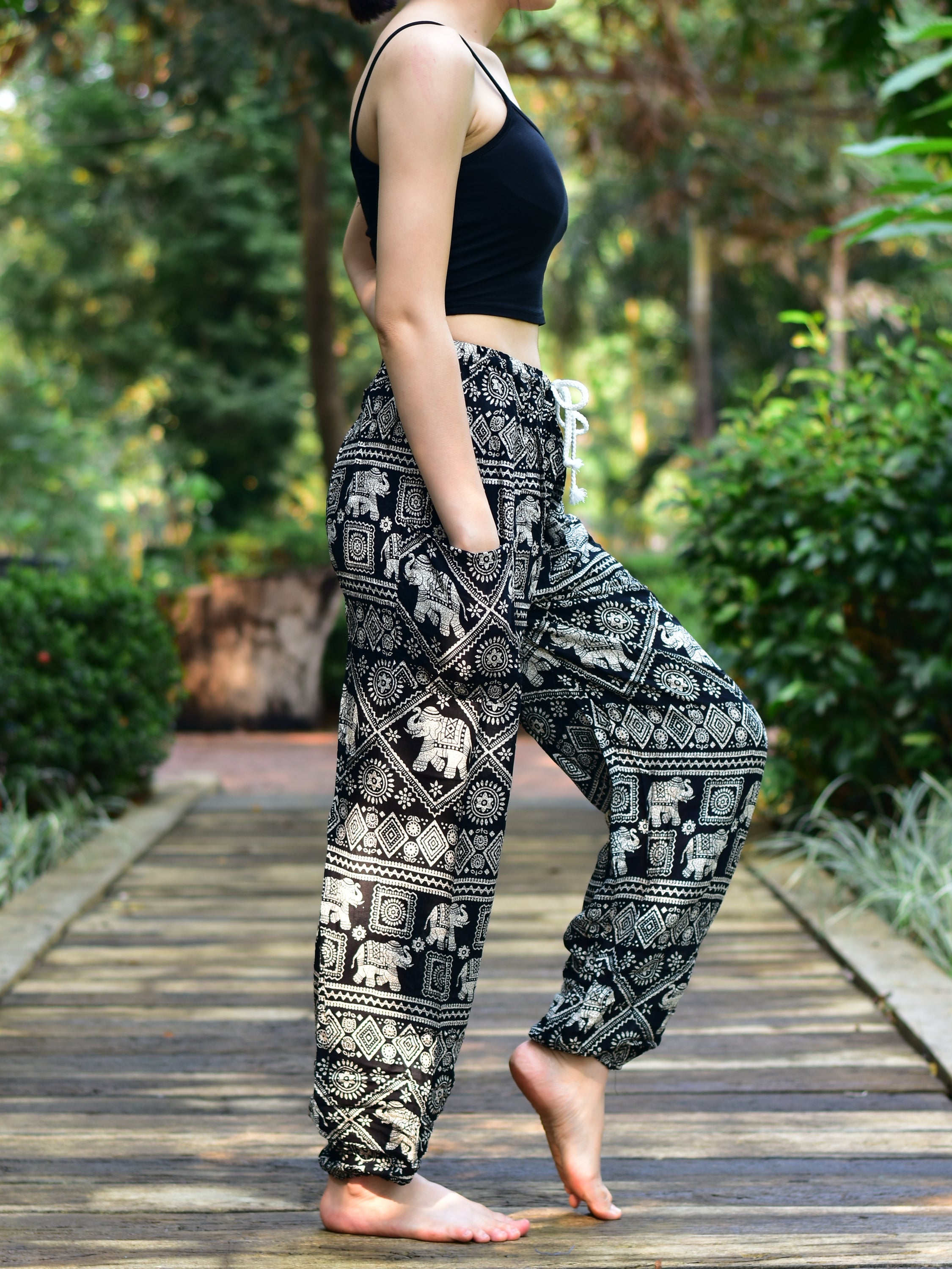 Bohotusk Black Elephant Print Women's Harem Pants featuring a drawstring waist and elasticated ankles, perfect for casual wear and yoga.