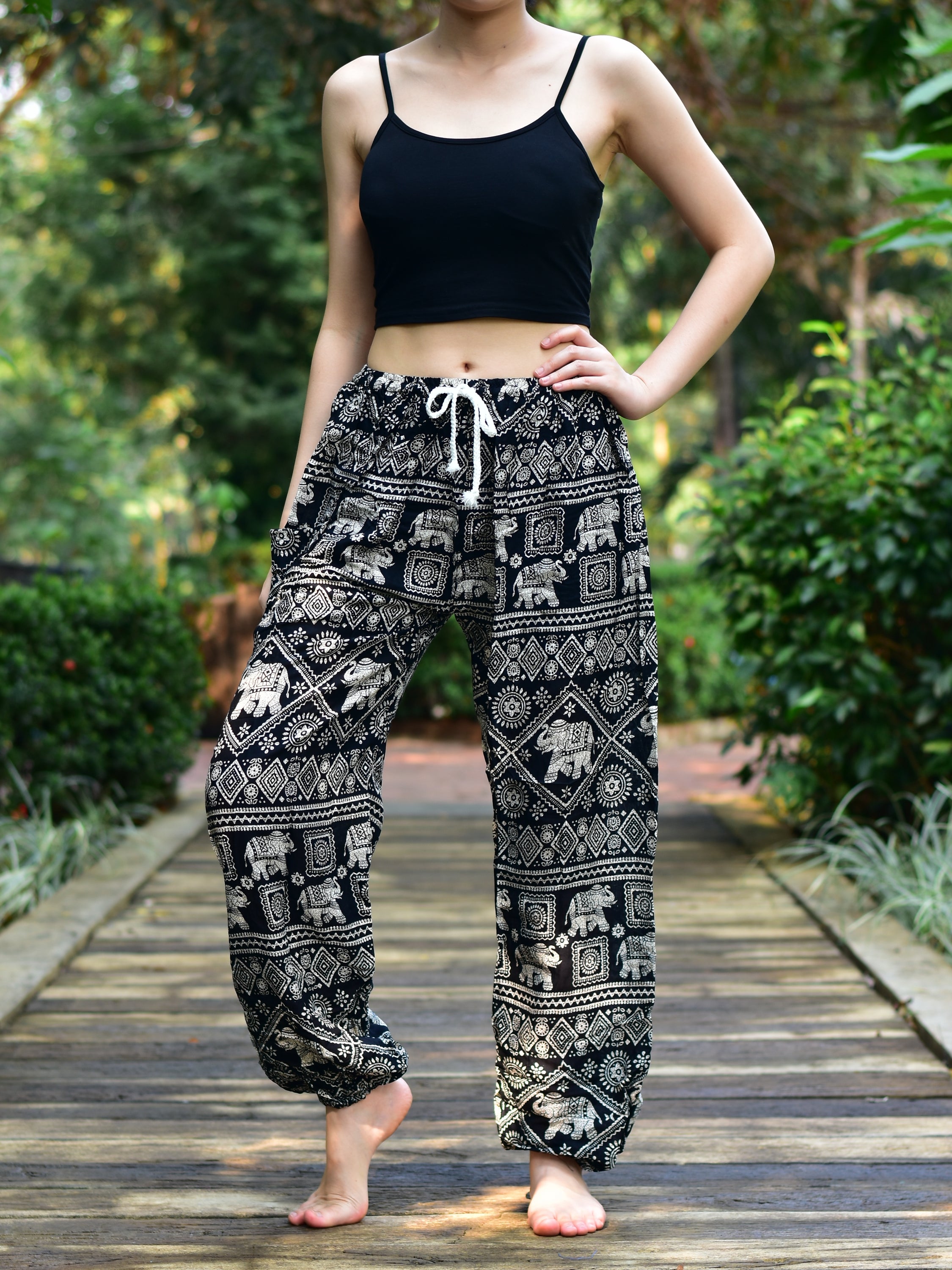 Bohotusk Black Elephant Print Women's Harem Pants featuring a drawstring waist and elasticated ankles, perfect for casual wear and yoga.