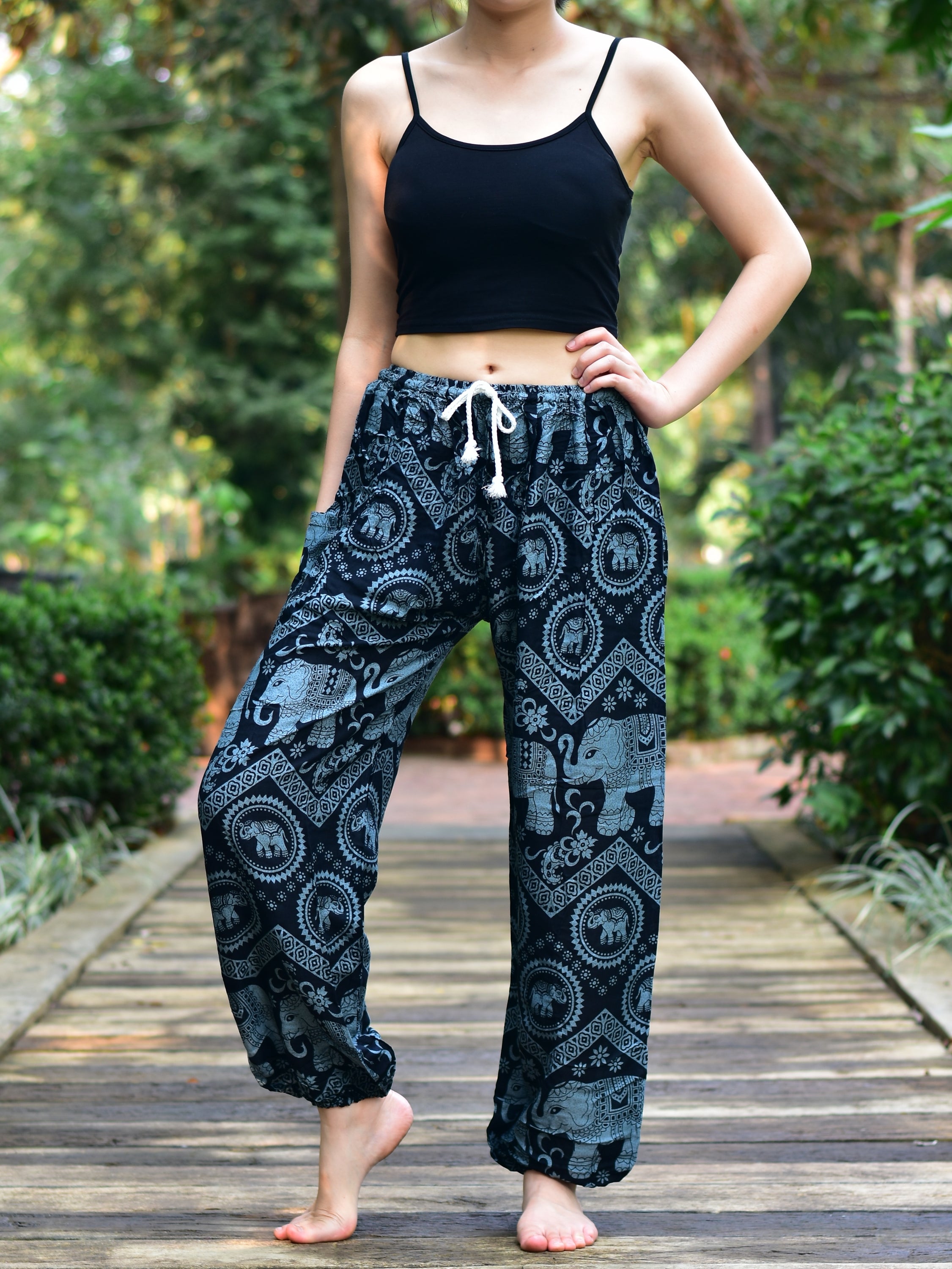 Bohotusk Black Elephant Tusker Print Women's Harem Pants featuring a vibrant elephant design, elasticated waist, and comfortable fit.