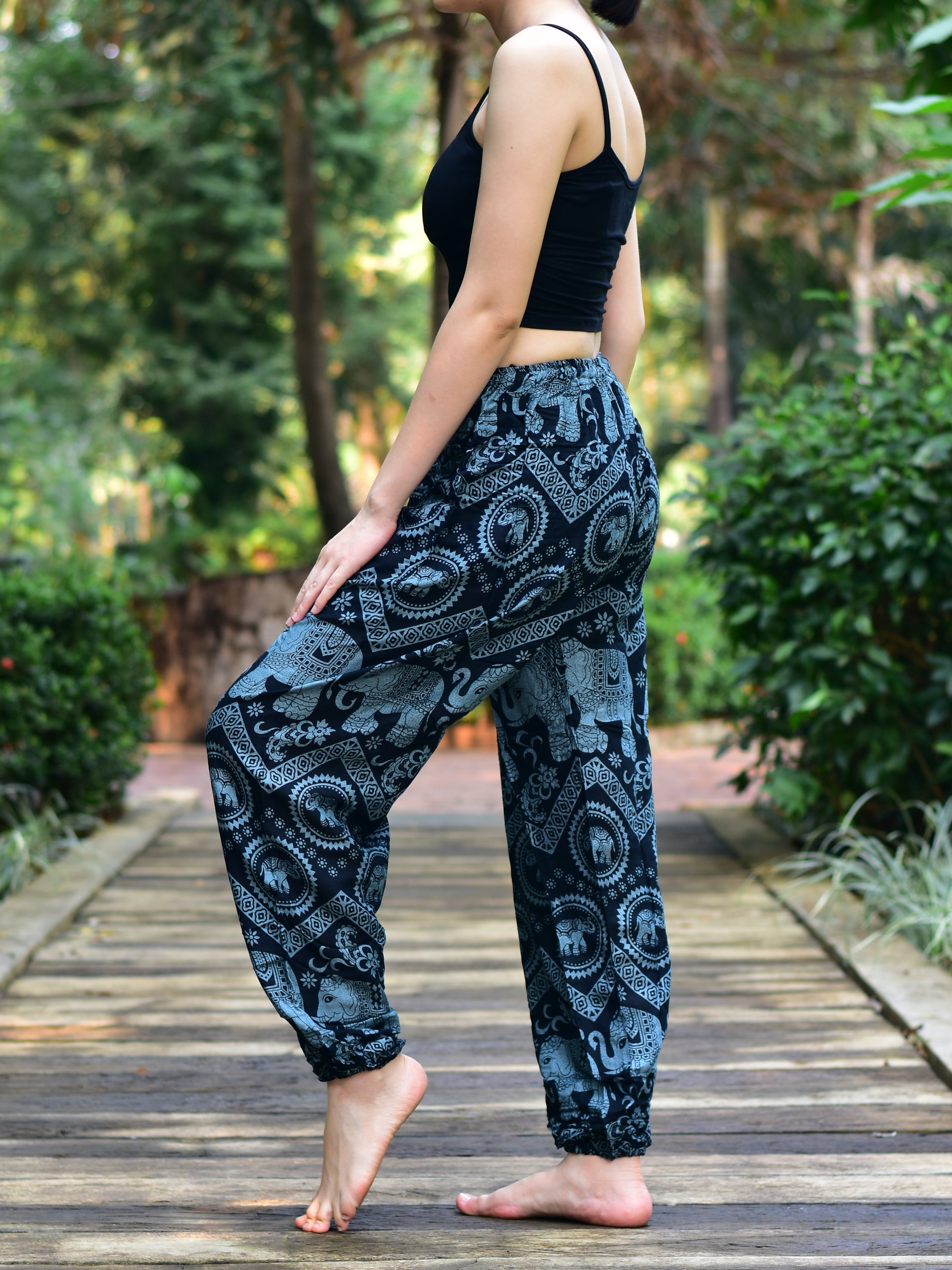 Bohotusk Black Elephant Tusker Print Women's Harem Pants featuring a vibrant elephant design, elasticated waist, and comfortable fit.