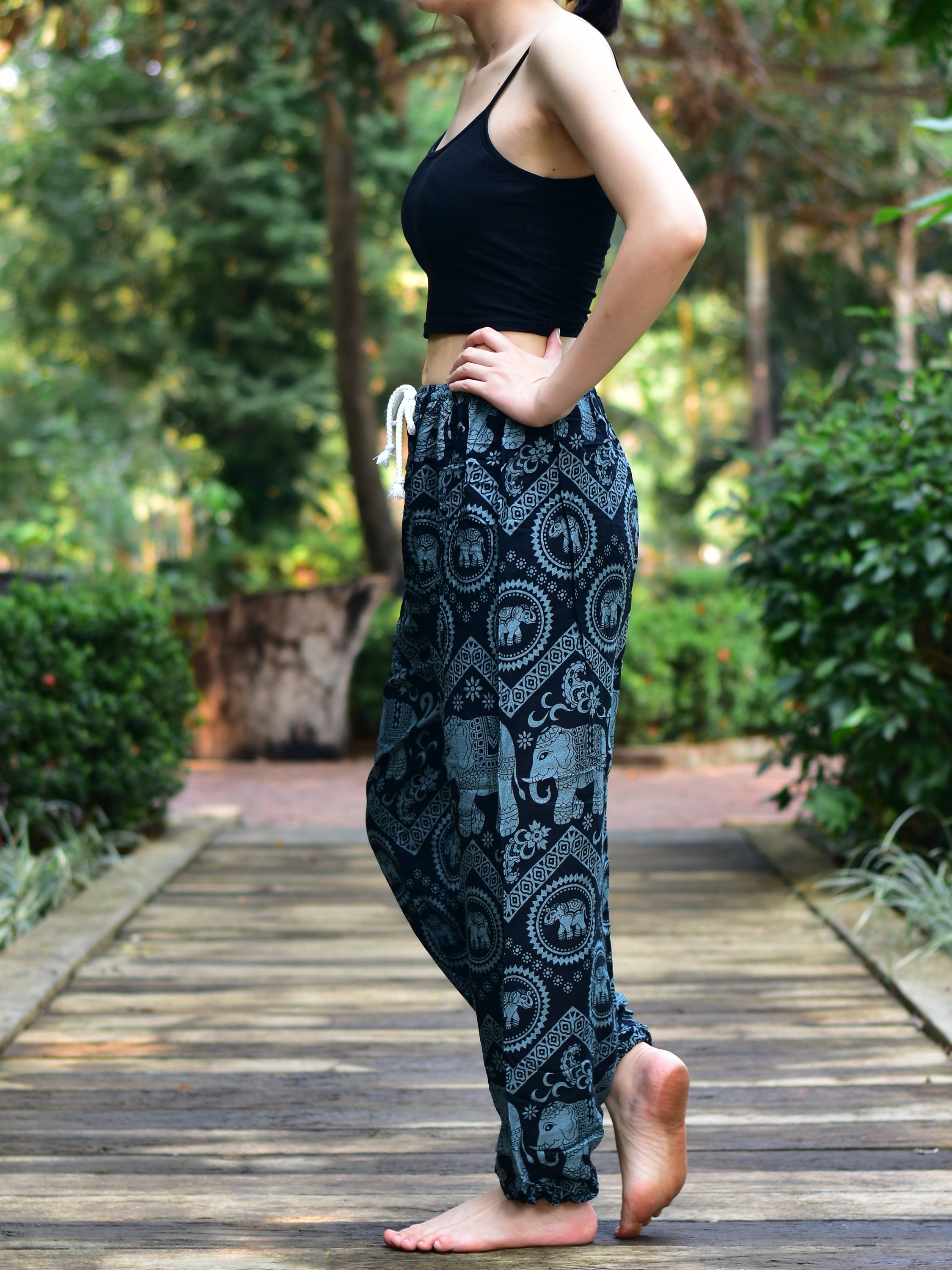 Bohotusk Black Elephant Tusker Print Women's Harem Pants featuring a vibrant elephant design, elasticated waist, and comfortable fit.