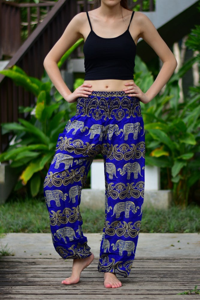 Bohotusk Blue Elephant Grassland Print trousers featuring an elasticated smocked waist, showcasing vibrant colors and a stylish design.