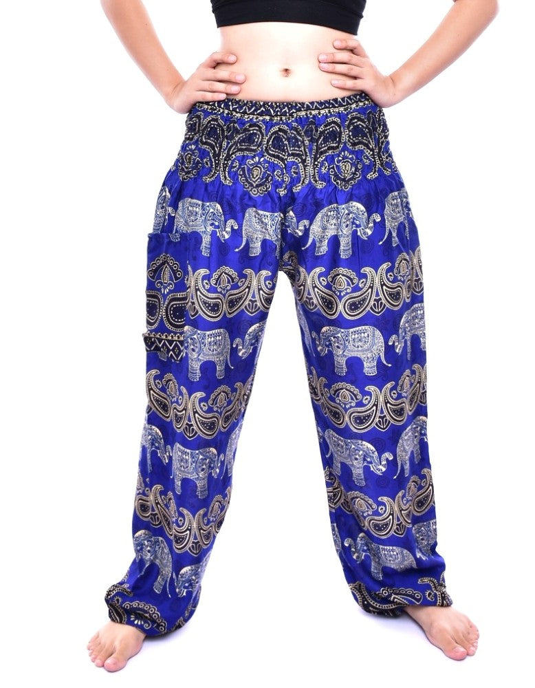 Bohotusk Blue Elephant Grassland Print trousers featuring an elasticated smocked waist, showcasing vibrant colors and a stylish design.