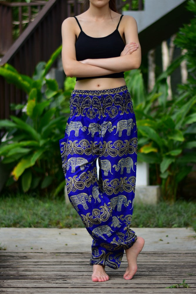 Bohotusk Blue Elephant Grassland Print trousers featuring an elasticated smocked waist, showcasing vibrant colors and a stylish design.