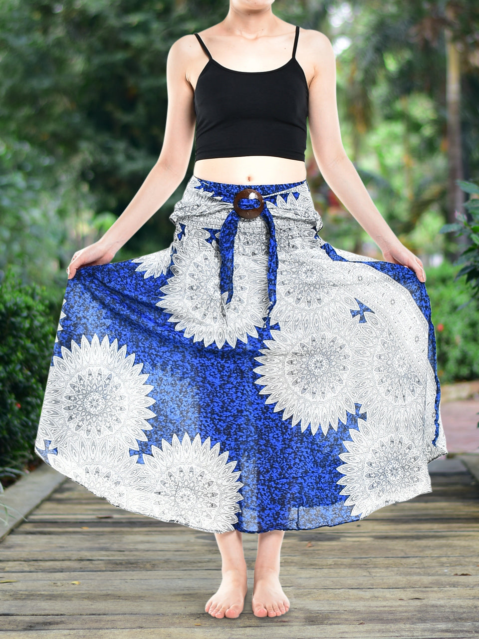 Bohotusk Blue Snowflake Long Skirt featuring a coconut buckle and smocked waist, styled elegantly for a versatile look.