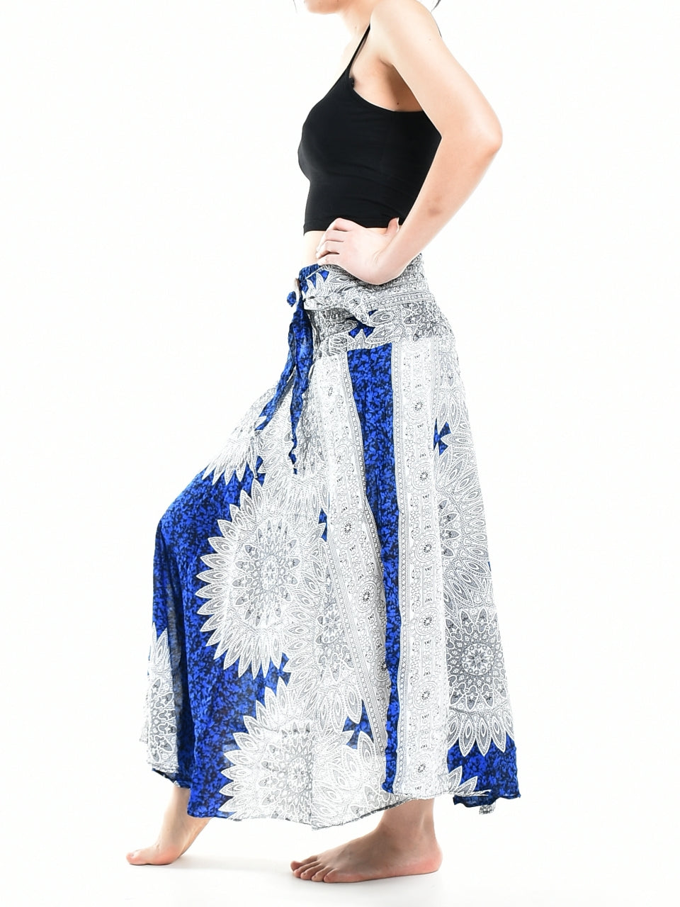 Bohotusk Blue Snowflake Long Skirt featuring a coconut buckle and smocked waist, styled elegantly for a versatile look.