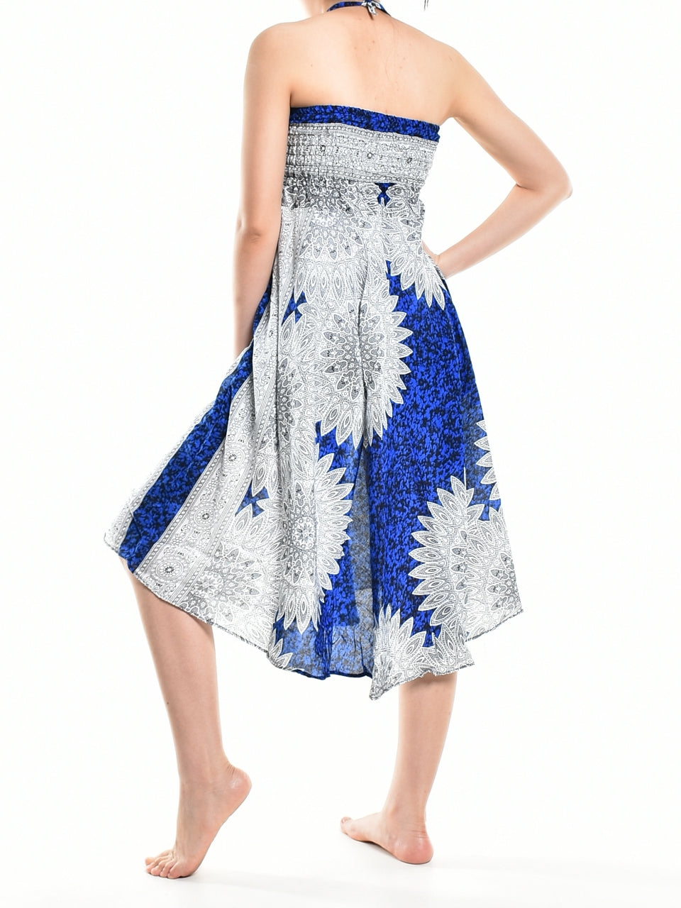 Bohotusk Blue Snowflake Long Skirt featuring a coconut buckle and smocked waist, styled elegantly for a versatile look.