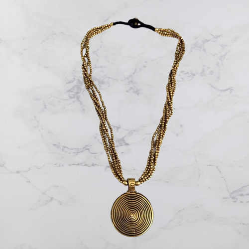 Bohotusk Brass Retro Vector Circle Pattern Multi Chain Pendant featuring a 6.5cm diameter brass pendant on a 54cm multi-part chain.