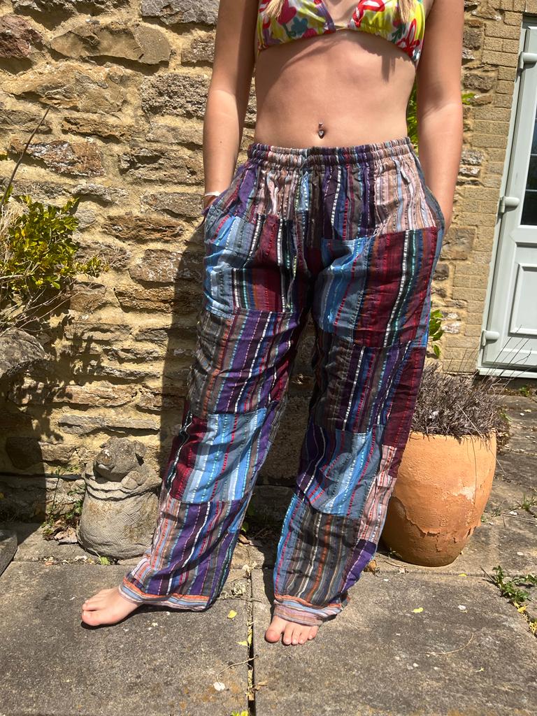 Bohotusk Cotton Multi Coloured Striped Harem Pants featuring an open leg ankle finish and elasticated waist, handmade in India.