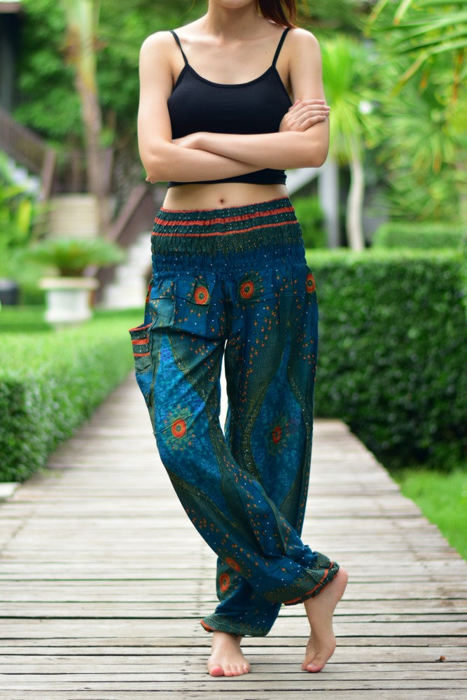 Bohotusk Kids Teal Green Moonshine Harem trousers featuring elasticated waist and ankles, made from soft rayon fabric.