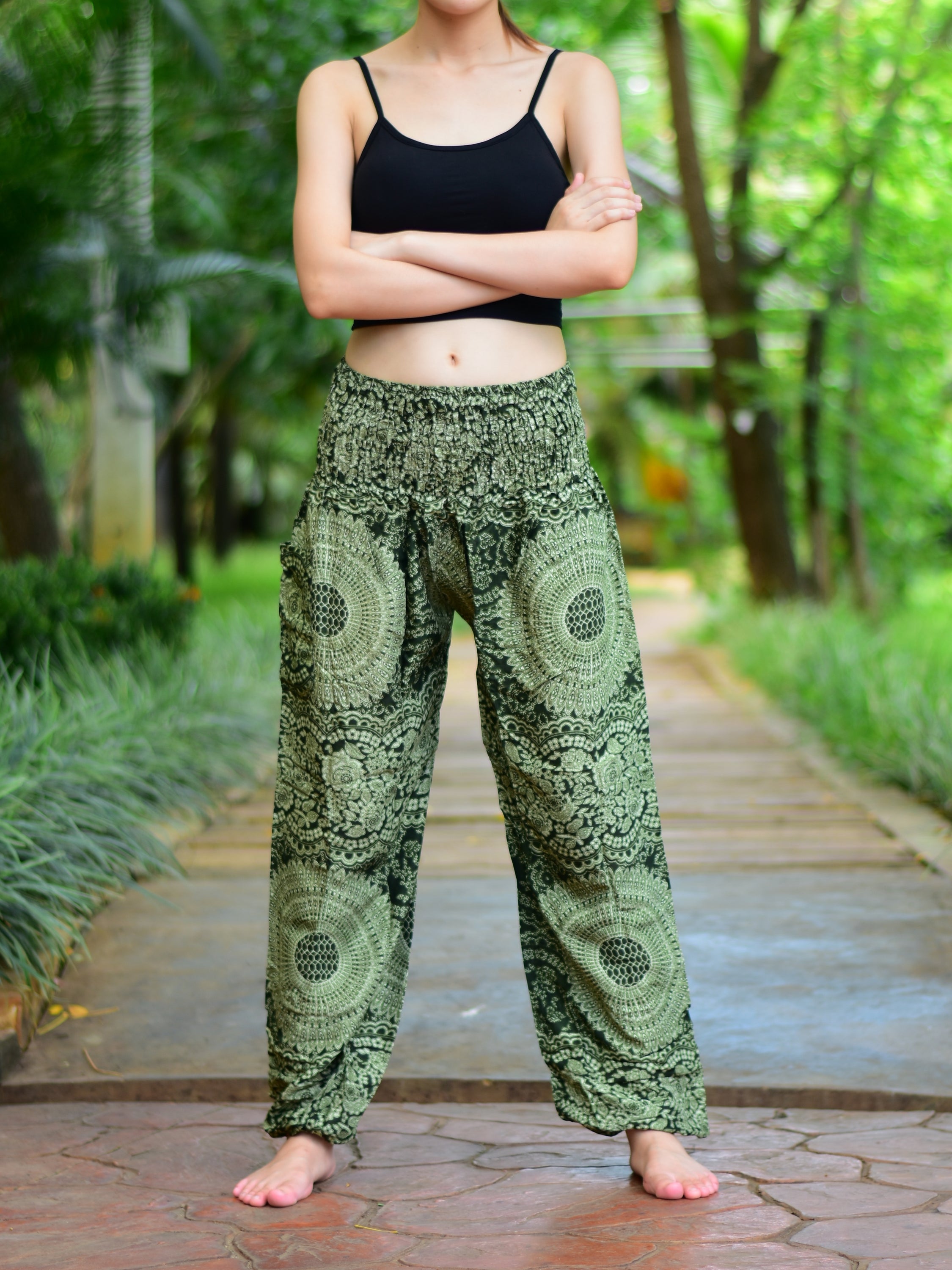 Bohotusk Olive Green Night Glow Print Women's Trousers with elasticated smocked waist, showcasing a stylish design and comfortable fit.