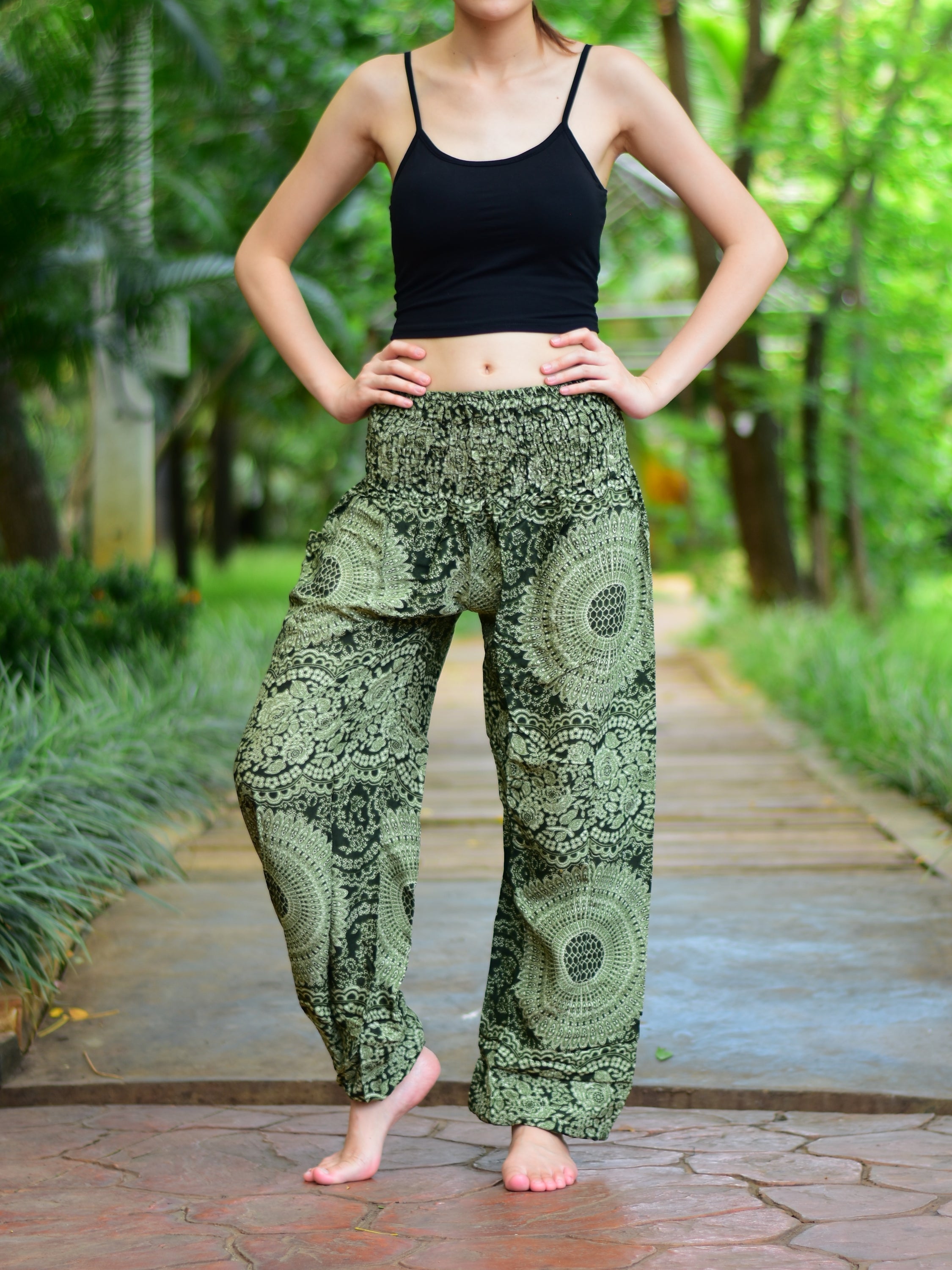 Bohotusk Olive Green Night Glow Print Women's Trousers with elasticated smocked waist, showcasing a stylish design and comfortable fit.