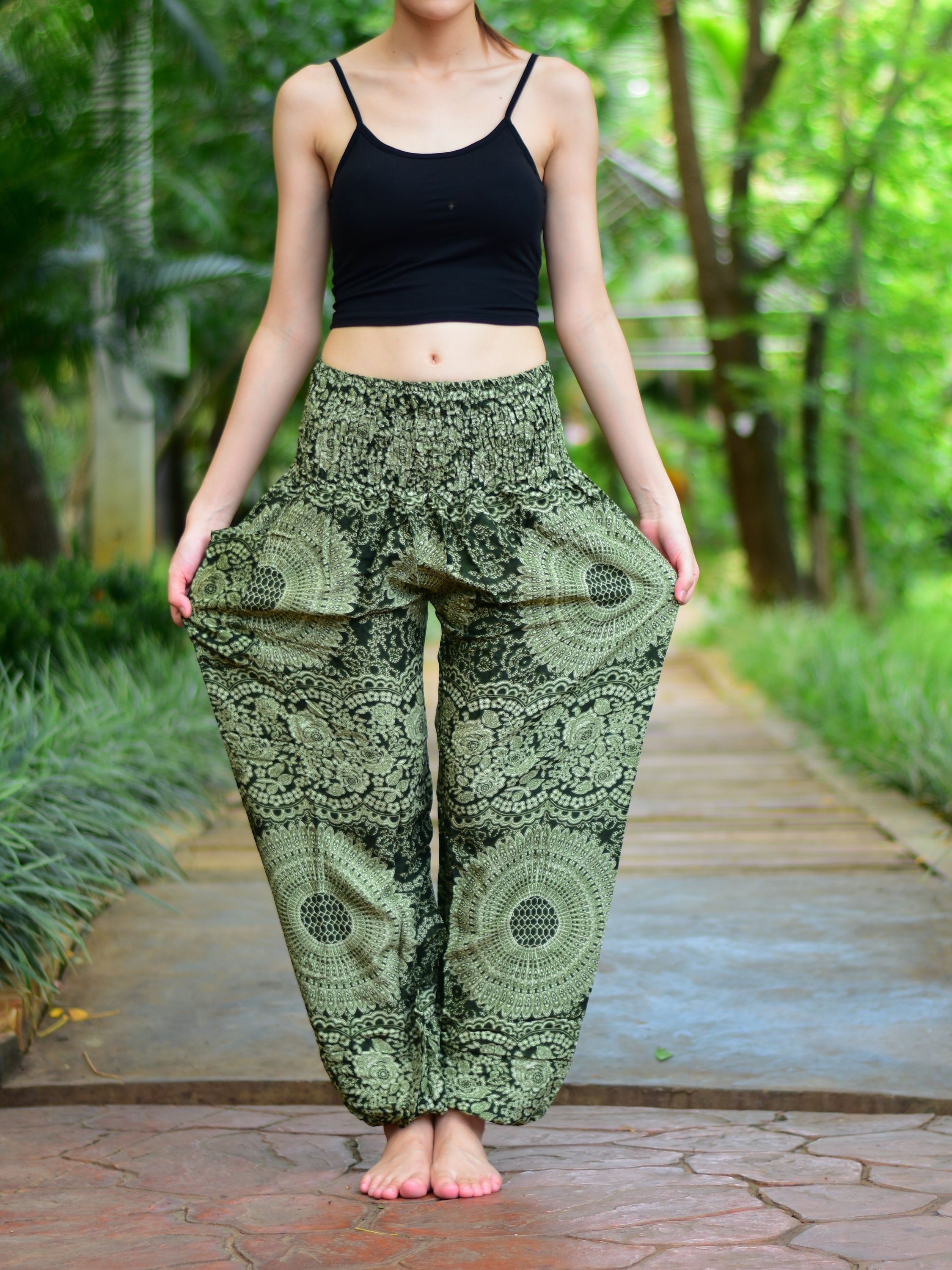 Bohotusk Olive Green Night Glow Print Women's Trousers with elasticated smocked waist, showcasing a stylish design and comfortable fit.