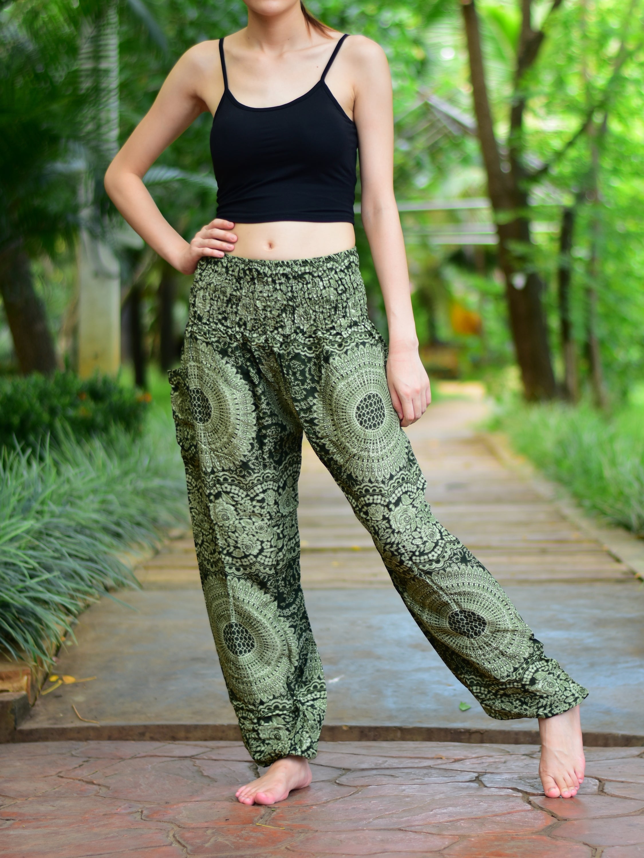 Bohotusk Olive Green Night Glow Print Women's Trousers with elasticated smocked waist, showcasing a stylish design and comfortable fit.