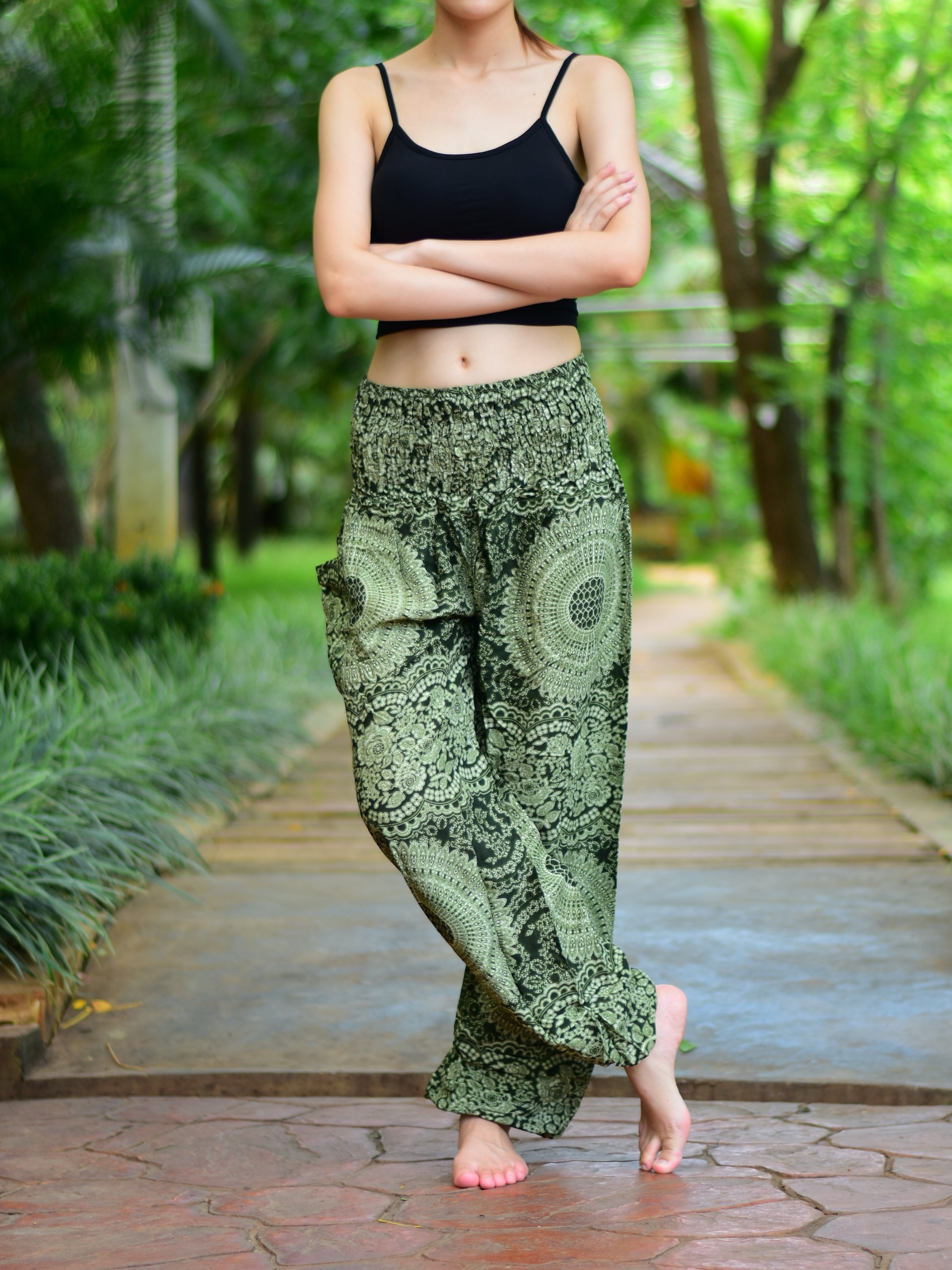 Bohotusk Olive Green Night Glow Print Women's Trousers with elasticated smocked waist, showcasing a stylish design and comfortable fit.