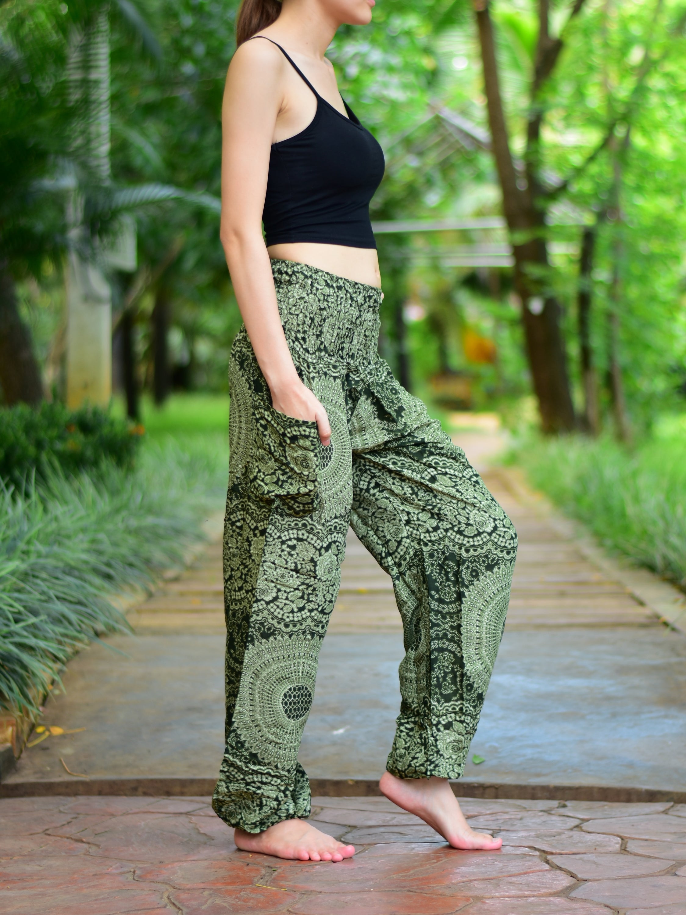 Bohotusk Olive Green Night Glow Print Women's Trousers with elasticated smocked waist, showcasing a stylish design and comfortable fit.