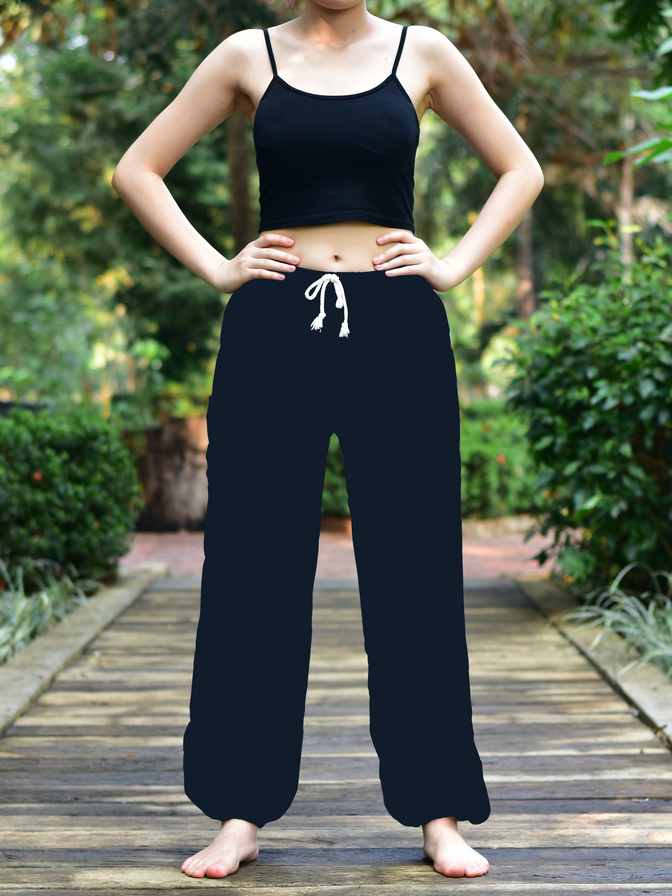 Bohotusk Plain Black Elephant Women's Harem Pants featuring a drawstring waist and elasticated ankles, made from lightweight Thai Rayon.