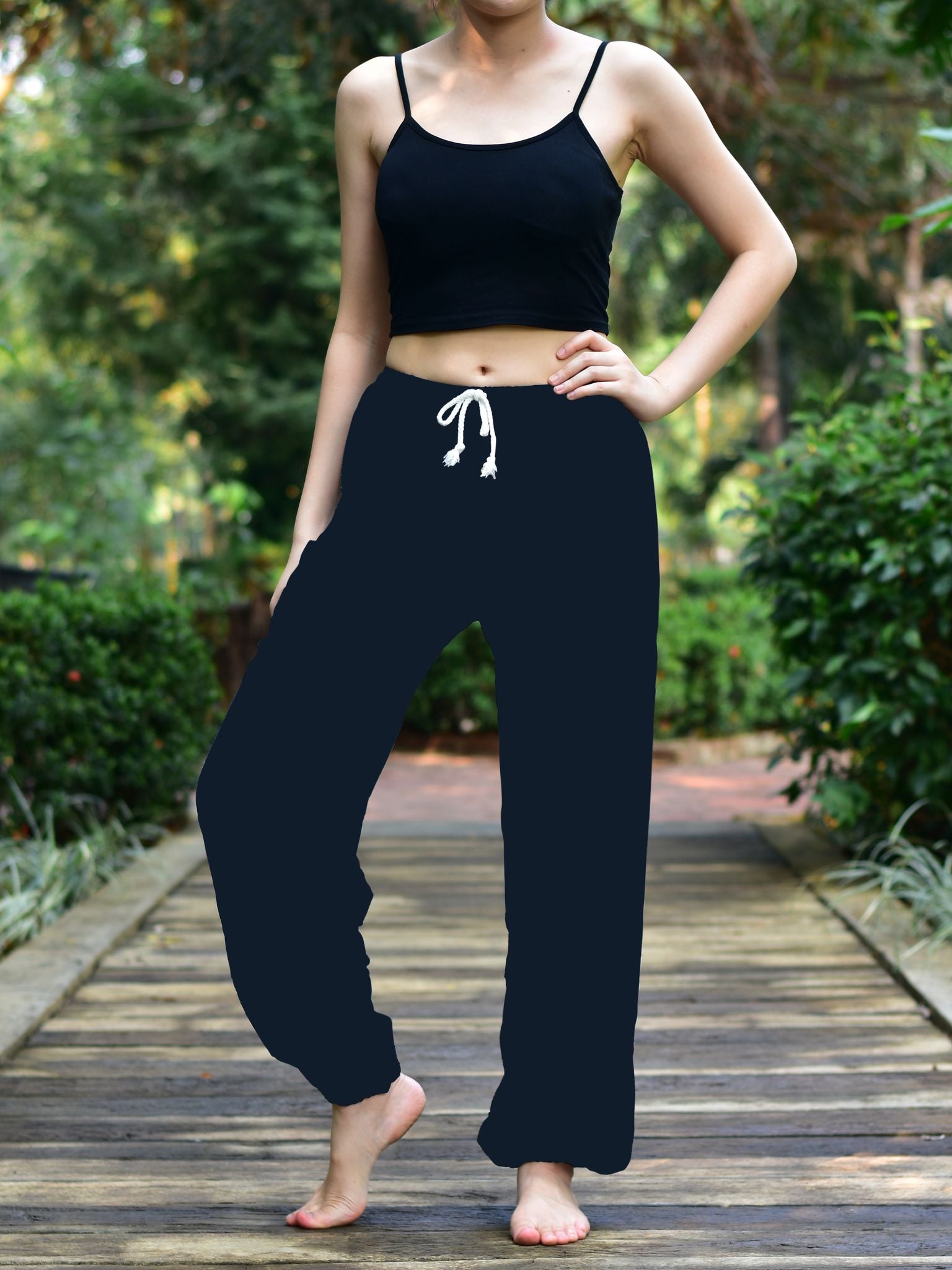 Bohotusk Plain Black Elephant Women's Harem Pants featuring a drawstring waist and elasticated ankles, made from lightweight Thai Rayon.