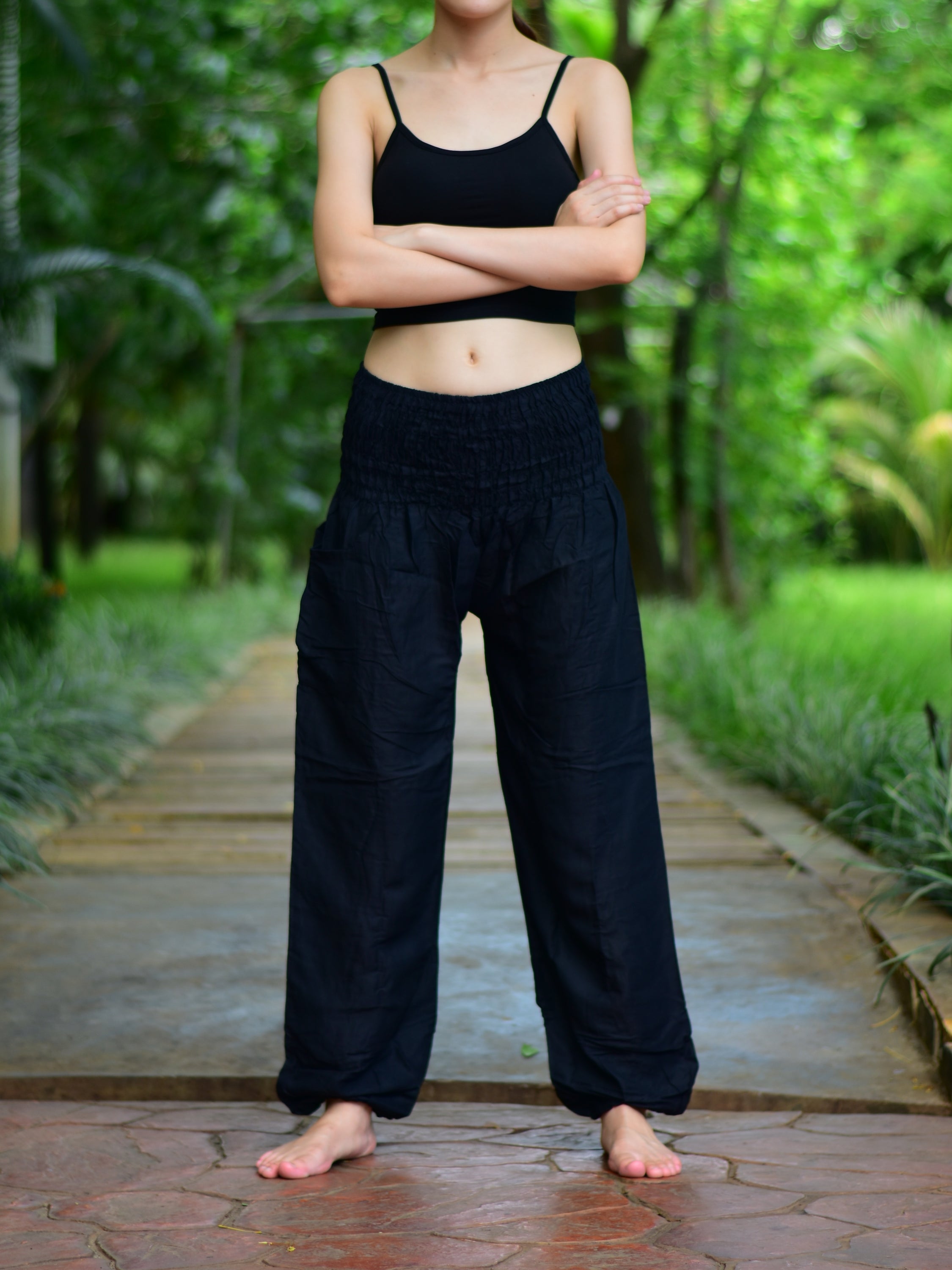 Bohotusk Plain Black Petite Fit Harem Pants displayed on a mannequin, showcasing the elasticated waist and ankle design.