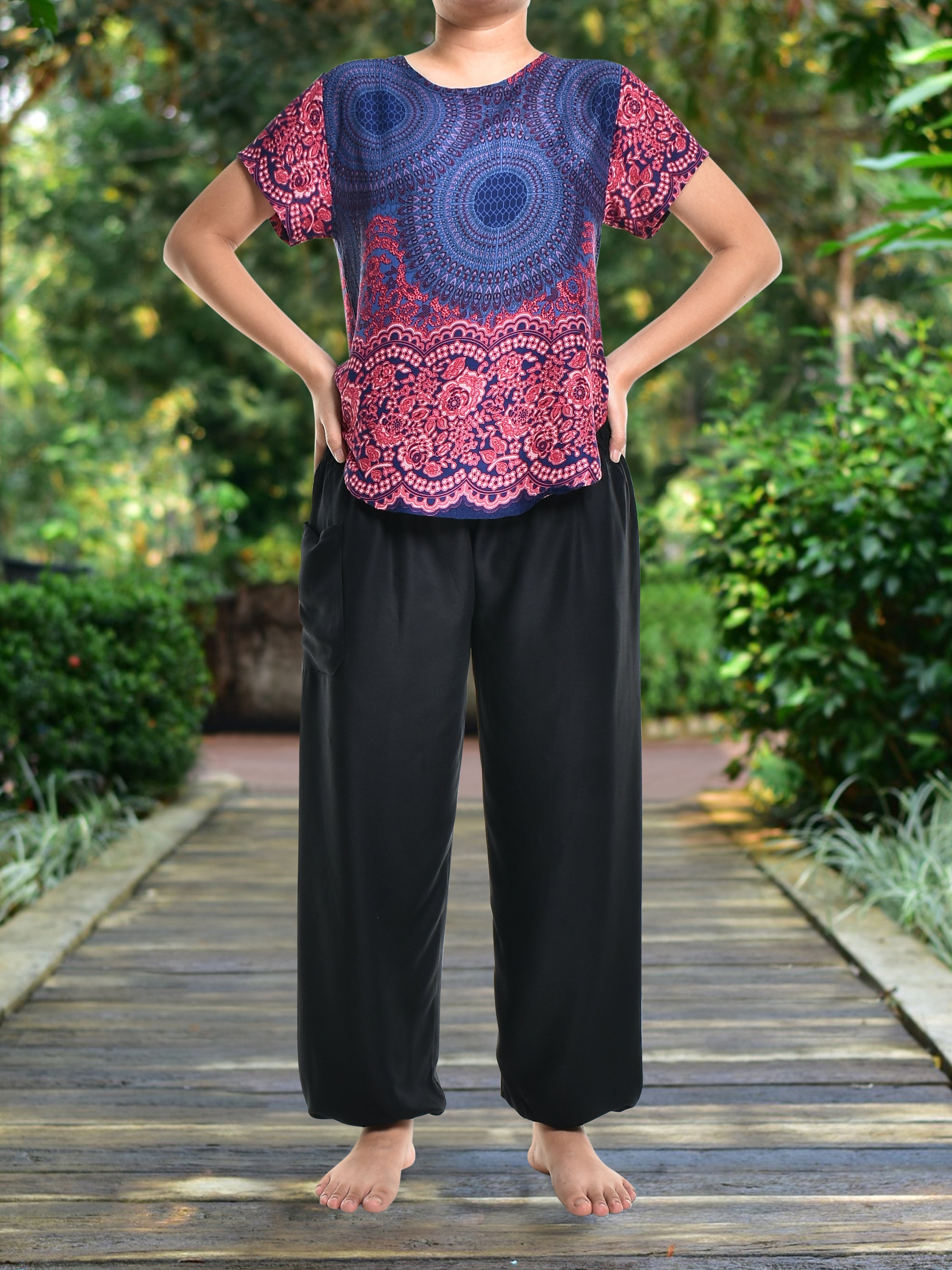 Bohotusk Purple Blue Rose Spheres Short Sleeved Top displayed on a mannequin, showcasing its vibrant colors and stylish design.