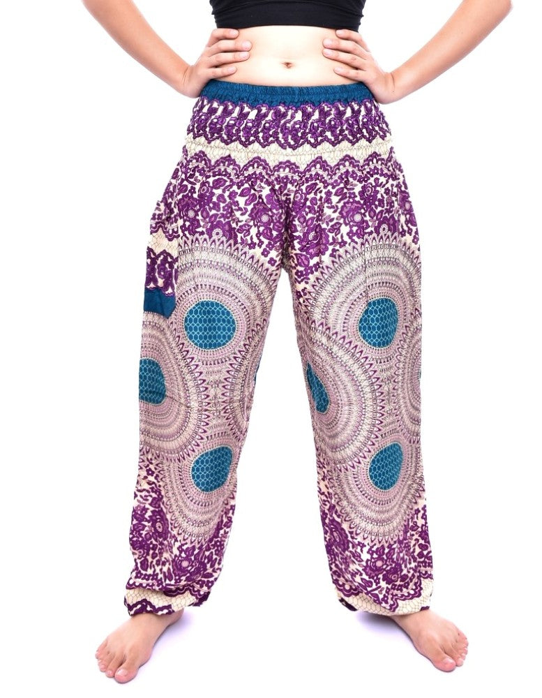 Bohotusk Purple Garden Swirl Print trousers with elasticated smocked waist, showcasing vibrant colors and lightweight fabric.