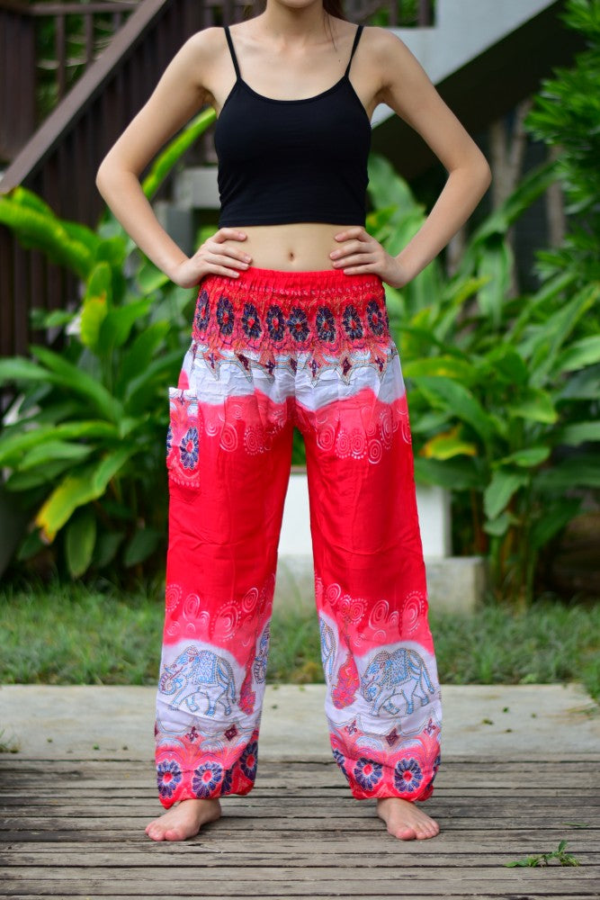 Bohotusk Red Elephant Boro Print trousers with elasticated smocked waist, showcasing vibrant colors and unique design, perfect for casual and active wear.