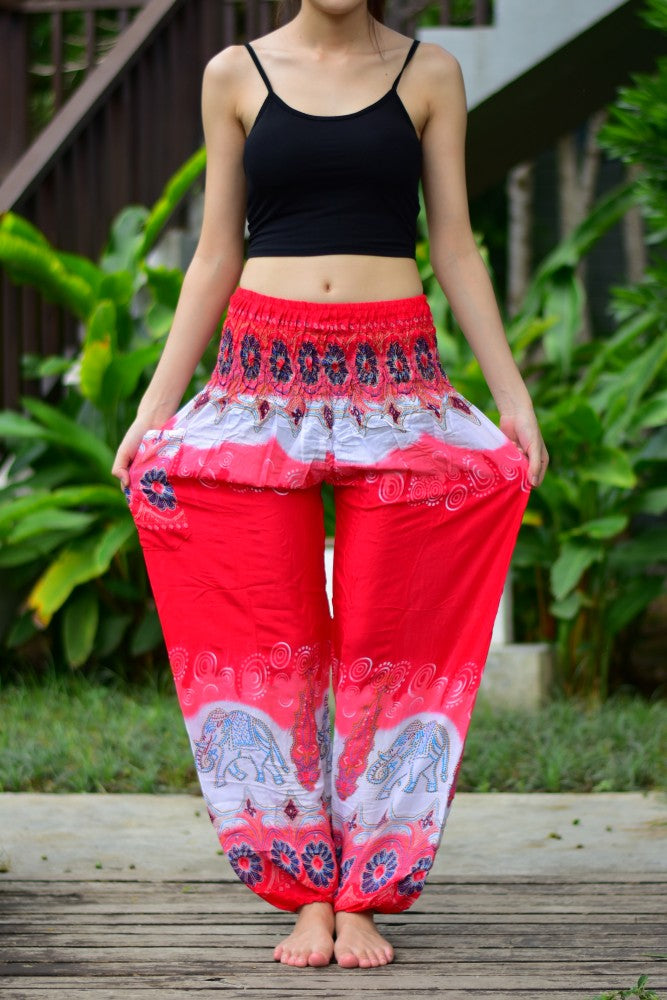 Bohotusk Red Elephant Boro Print trousers with elasticated smocked waist, showcasing vibrant colors and unique design, perfect for casual and active wear.