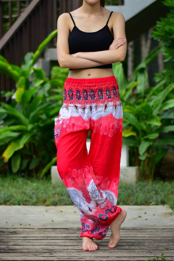 Bohotusk Red Elephant Boro Print trousers with elasticated smocked waist, showcasing vibrant colors and unique design, perfect for casual and active wear.