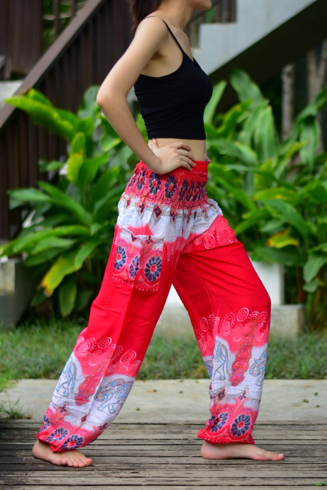 Bohotusk Red Elephant Boro Print trousers with elasticated smocked waist, showcasing vibrant colors and unique design, perfect for casual and active wear.