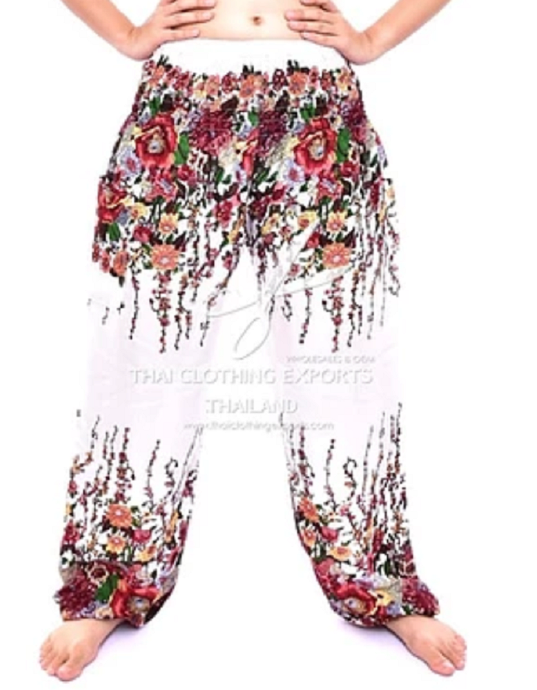 Bohotusk White Floral Print Elasticated Smocked Waist Womens Harem pants displayed on a model, showcasing the floral design and elasticated waist.