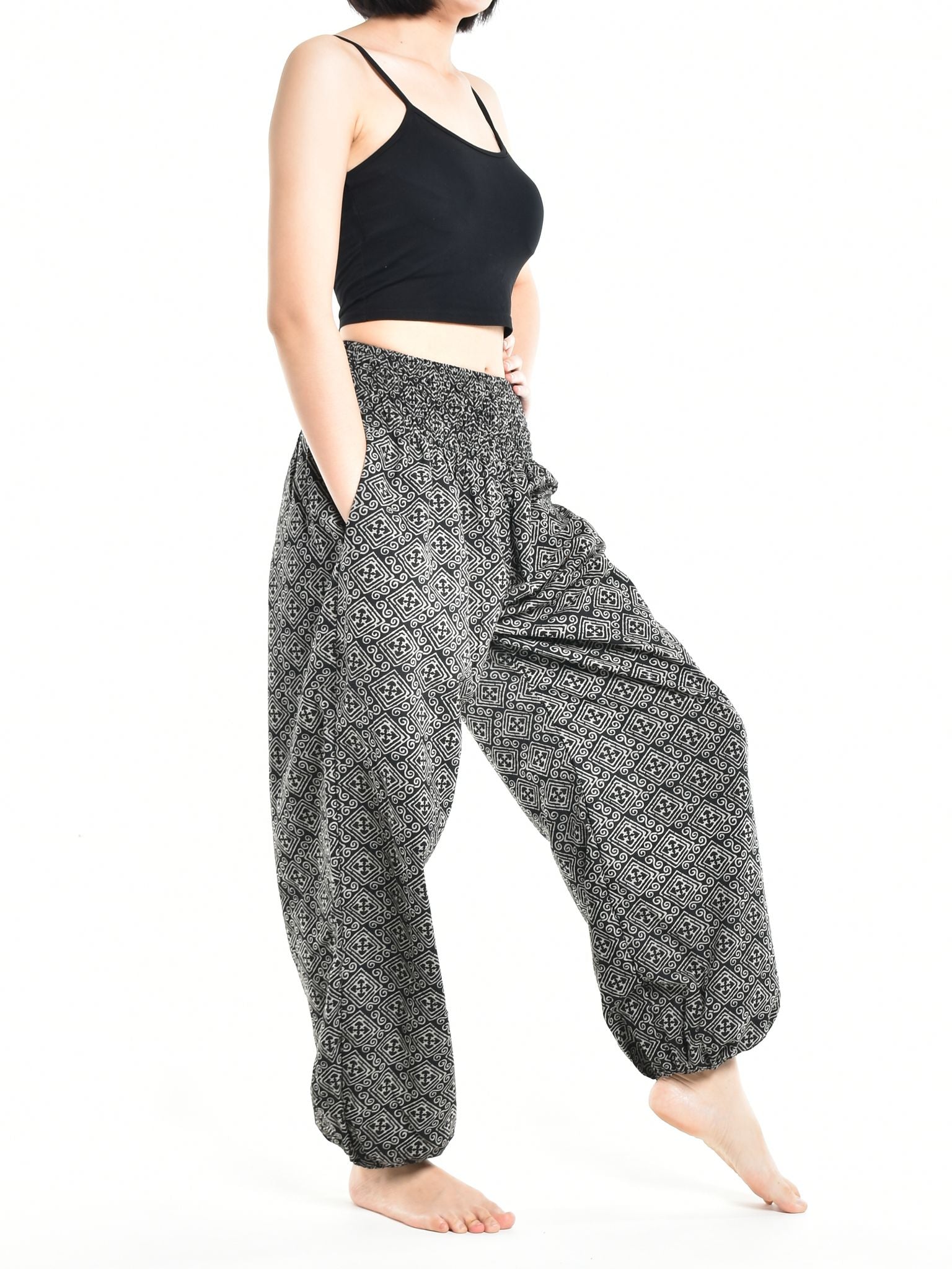 Bohotusk Women's Autumn Black Zig Zag Cotton Harem Pants displayed on a mannequin, showcasing the elasticated waist and ankle design.