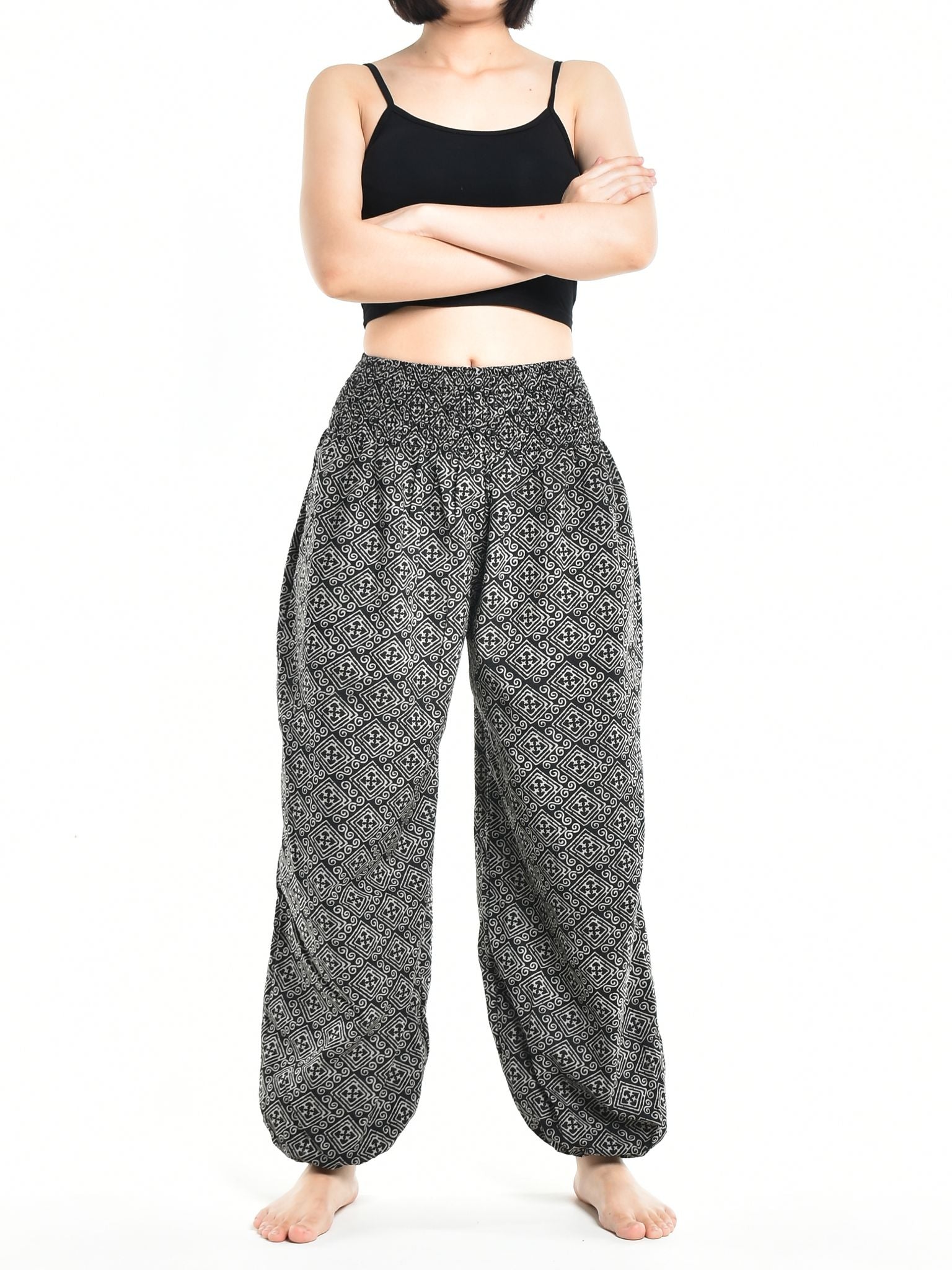 Bohotusk Women's Autumn Black Zig Zag Cotton Harem Pants displayed on a mannequin, showcasing the elasticated waist and ankle design.