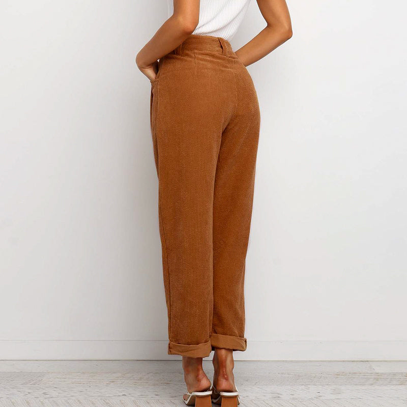 Casual crimping women corduroy pants in solid color, featuring pleated front and pockets, perfect for stylish and comfortable wear.