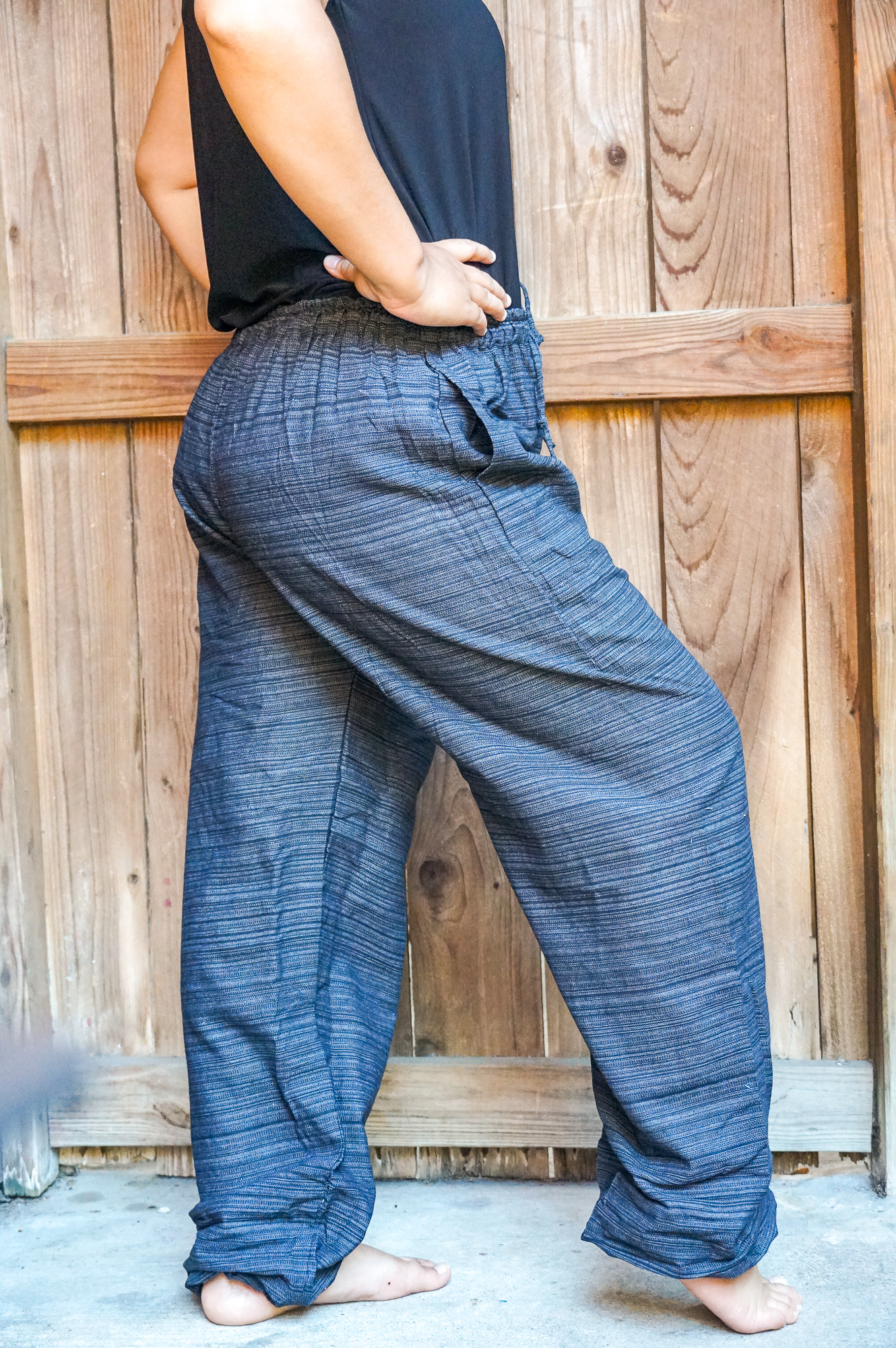 A pair of stylish Cotton Boho Hippie Gypsy Pants in soft cotton fabric, featuring an elastic drawstring waist and ankle cuffs, perfect for casual wear.